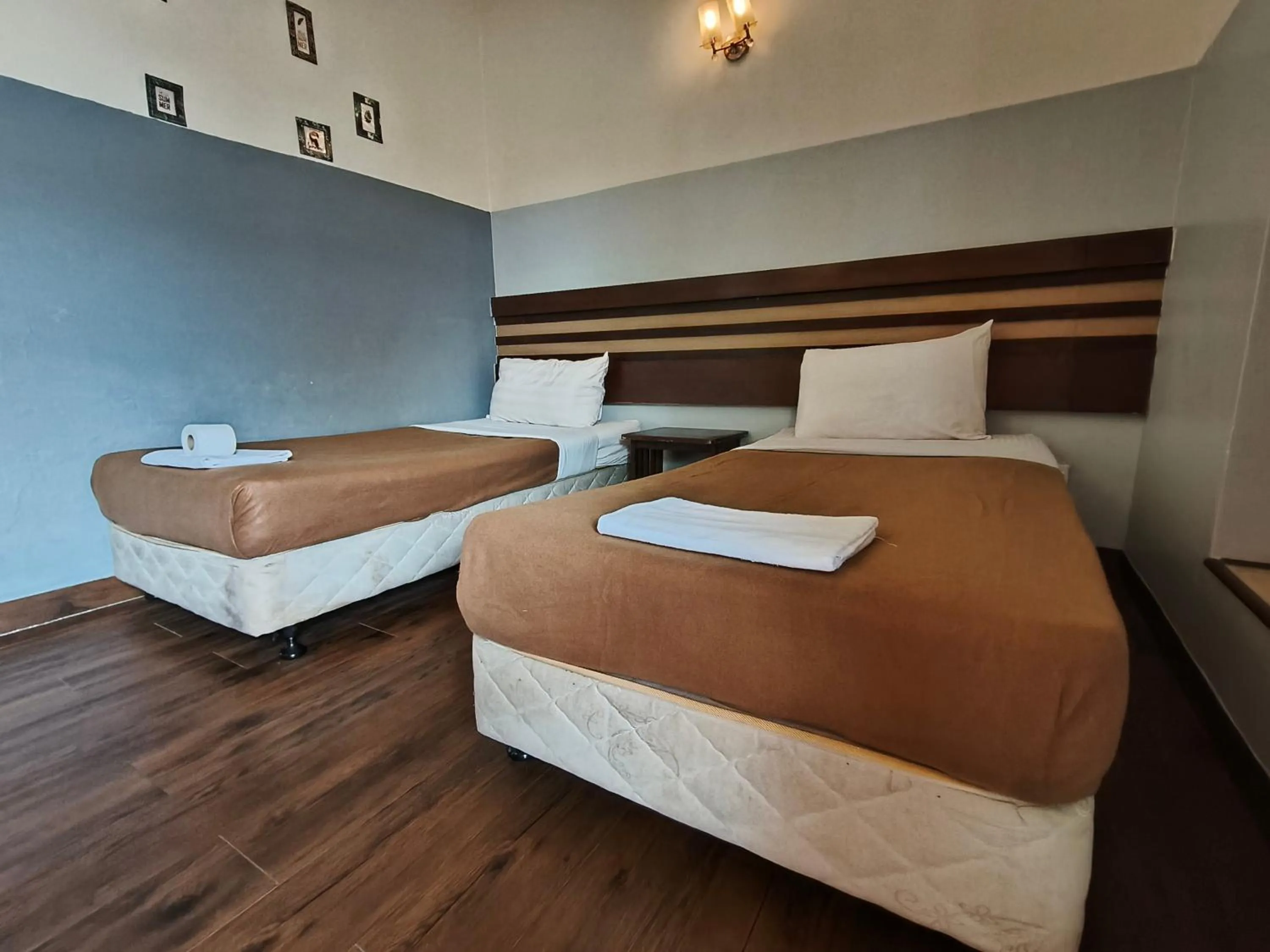 Bed in Cozzy Motel Malacca