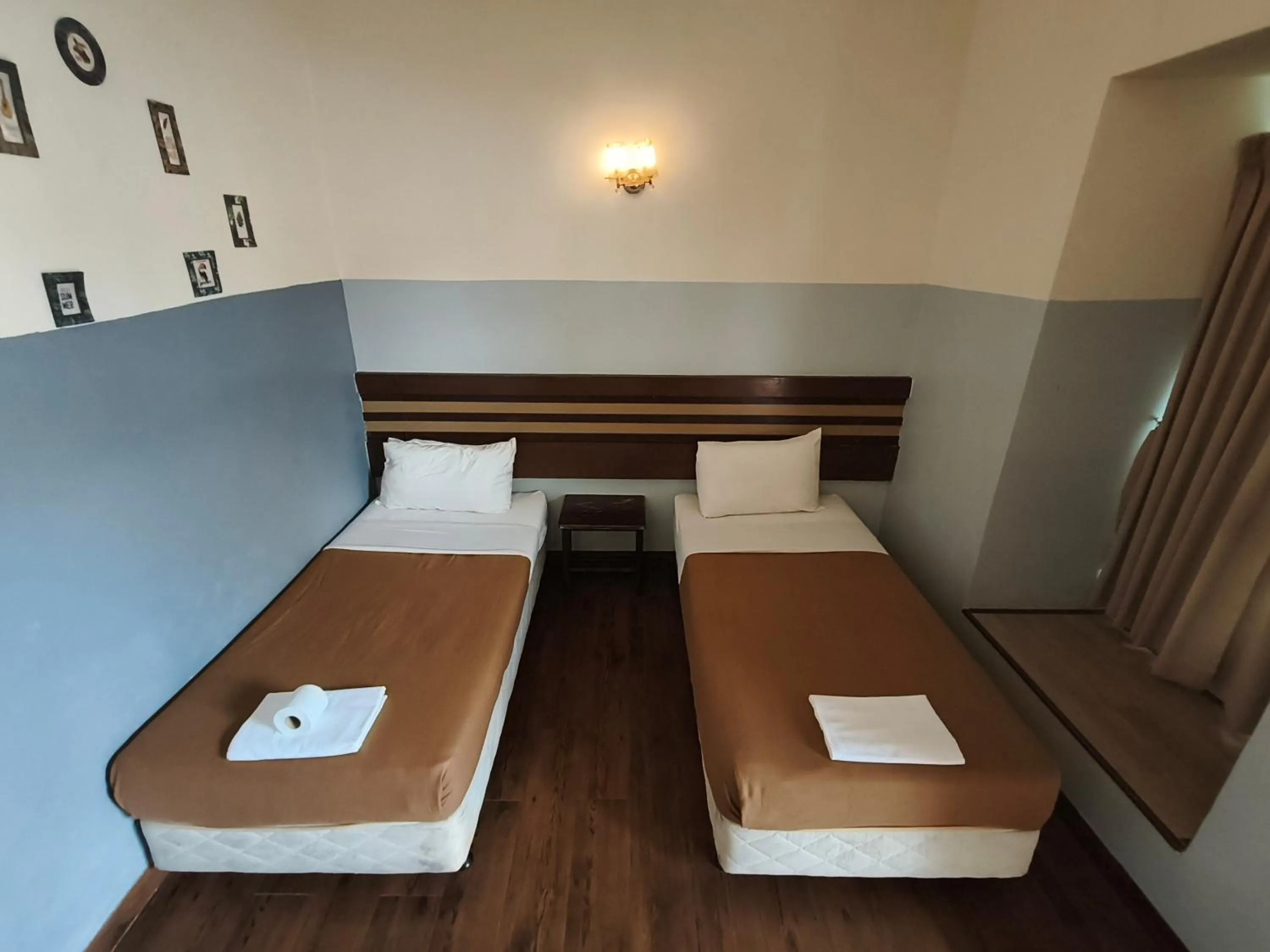 Bed in Cozzy Motel Malacca