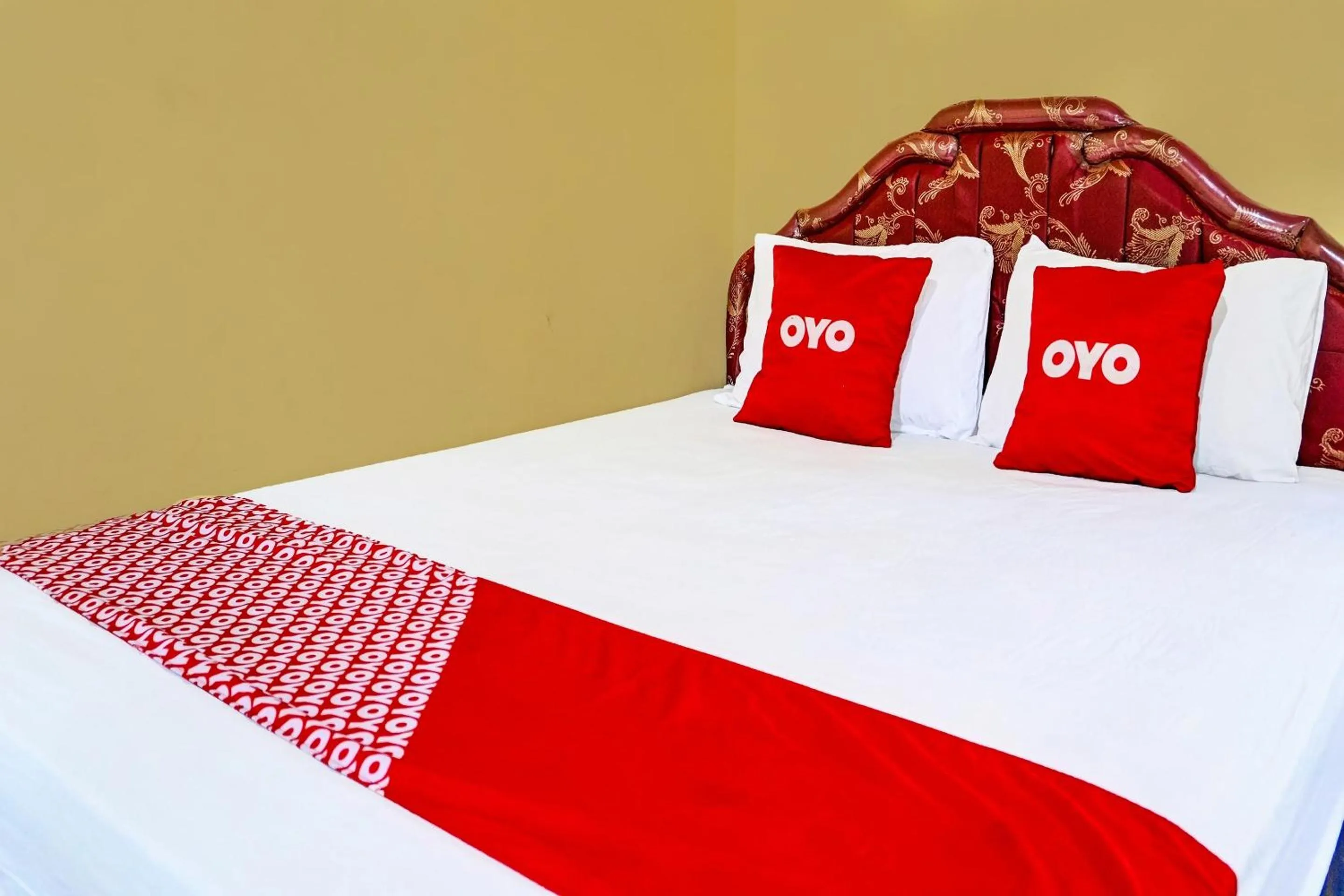 Bedroom in SPOT ON 91798 Hotel Grand Mutiara