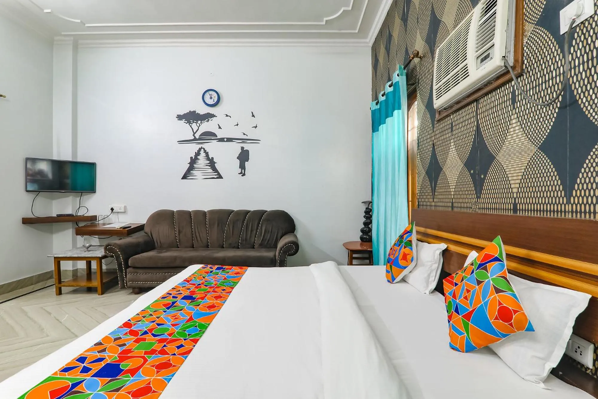 Bed in FabHotel Raka Inn