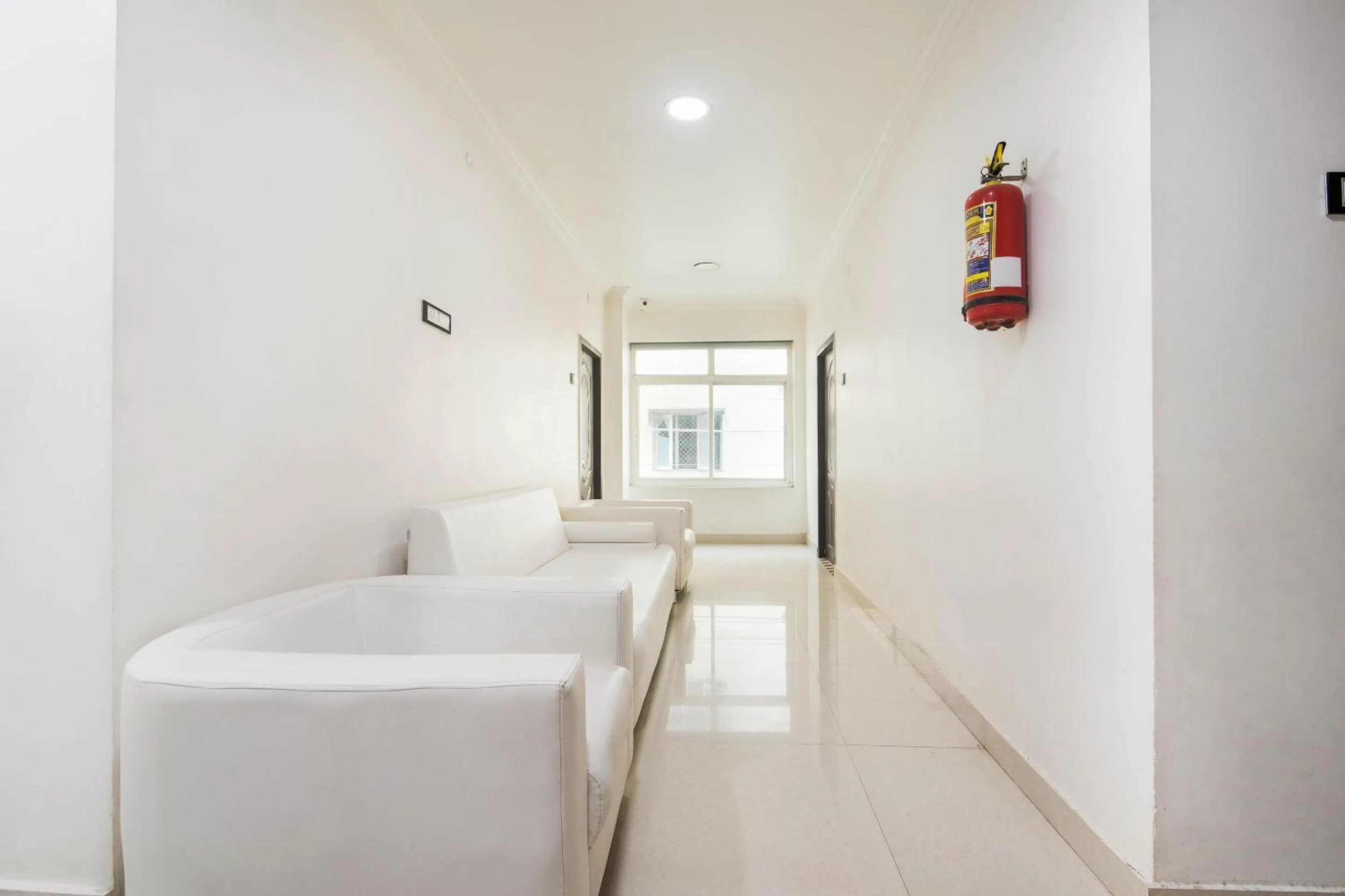 Lobby or reception, Bed in Capital O Aditya Grand