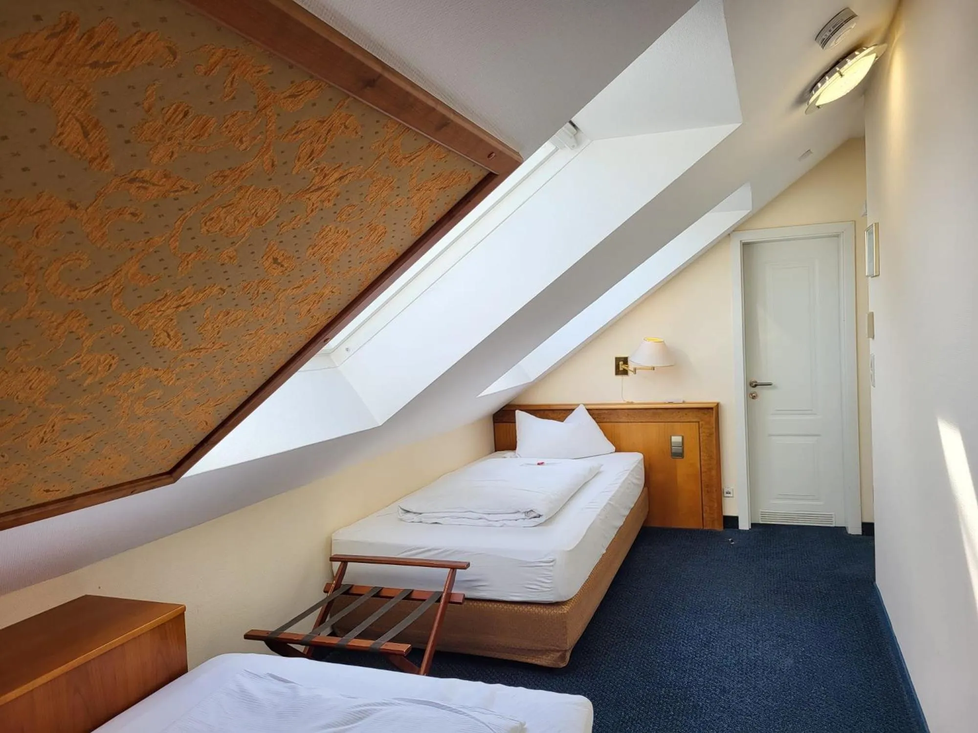 Photo of the whole room, Bed in Hotel Ochsen Stuttgart