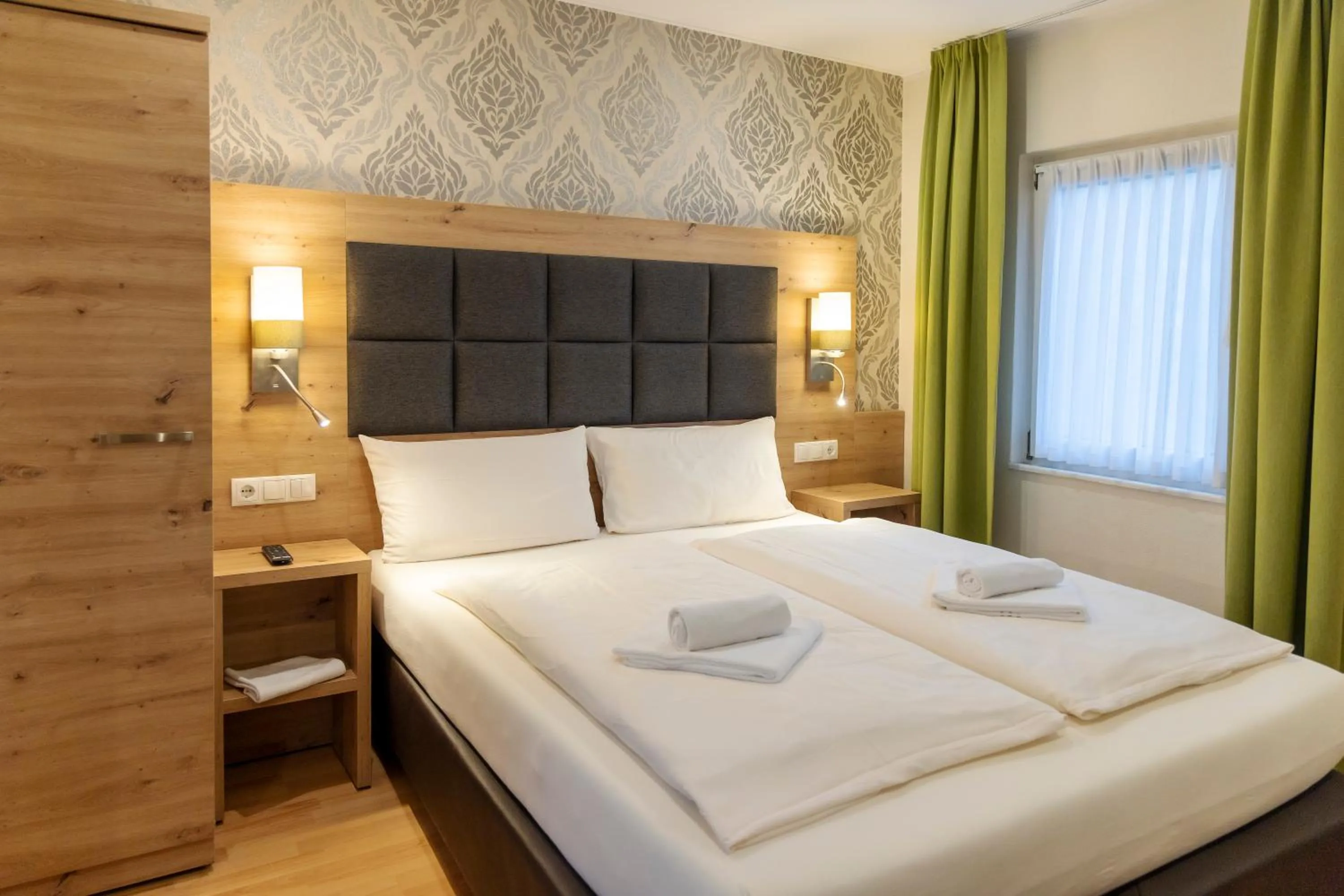 Bed in AKZENT Hotel Restaurant Roter Ochse Rhens bei Koblenz