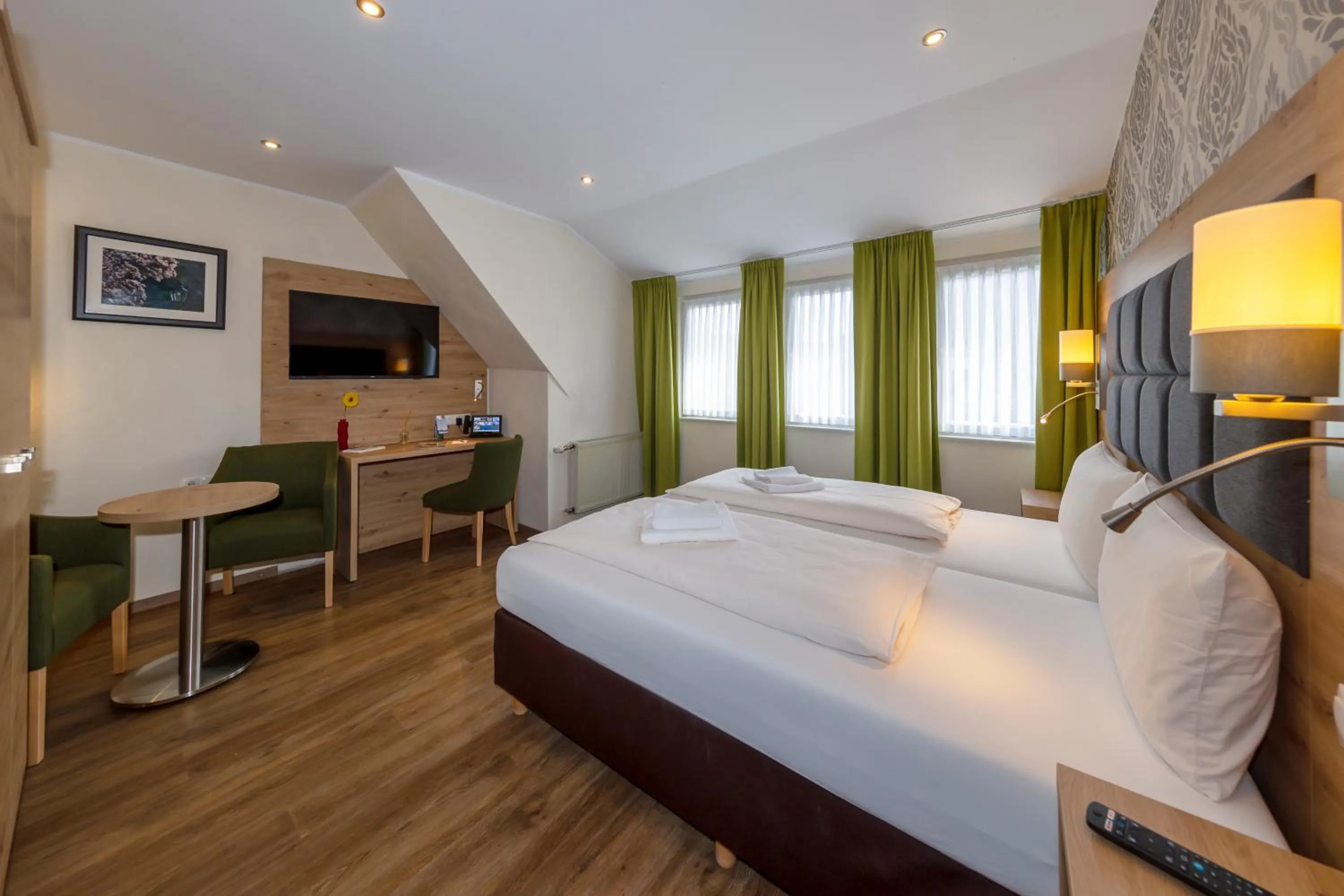 Bed in AKZENT Hotel Restaurant Roter Ochse Rhens bei Koblenz