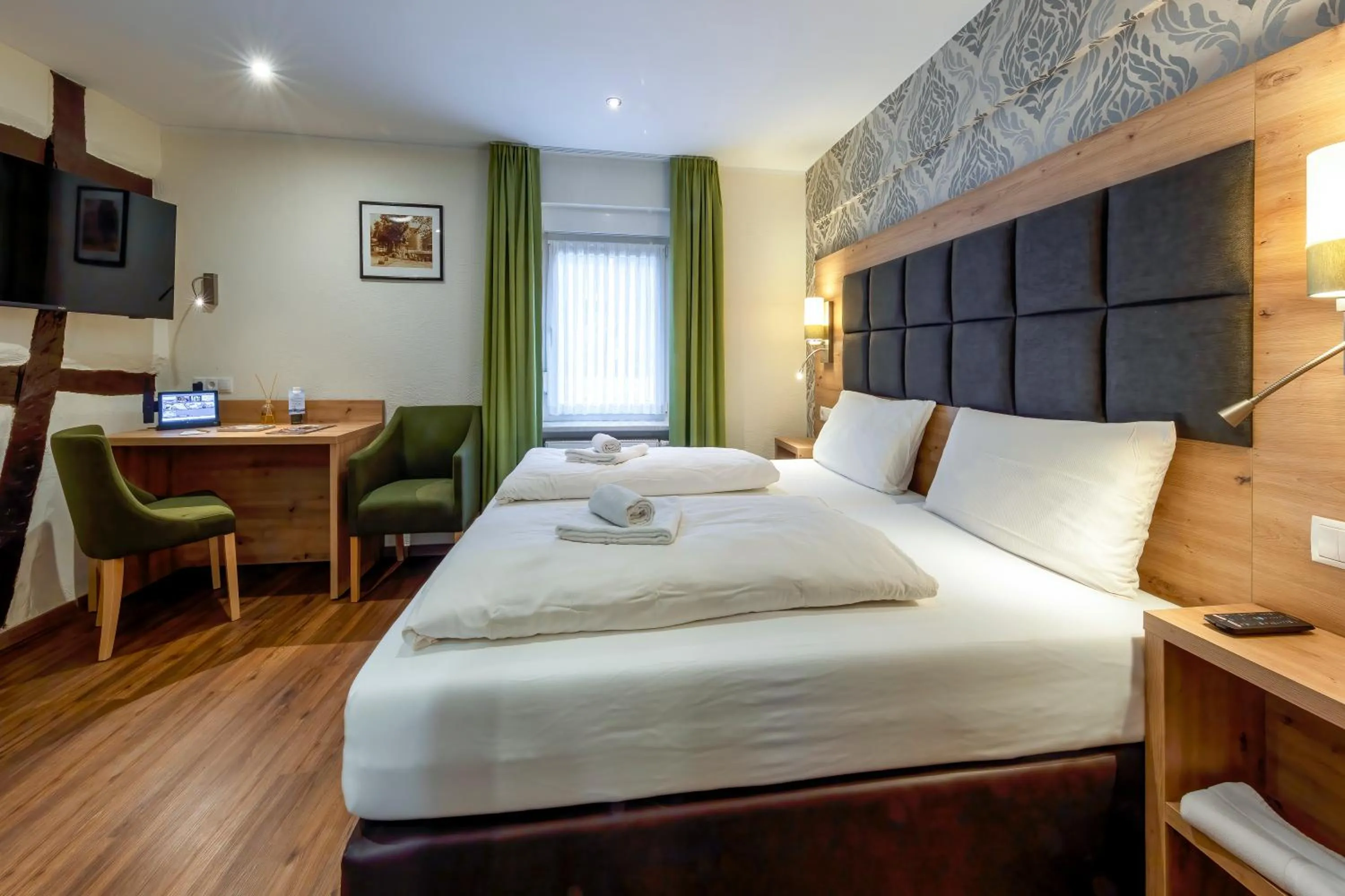 Bed in AKZENT Hotel Restaurant Roter Ochse Rhens bei Koblenz