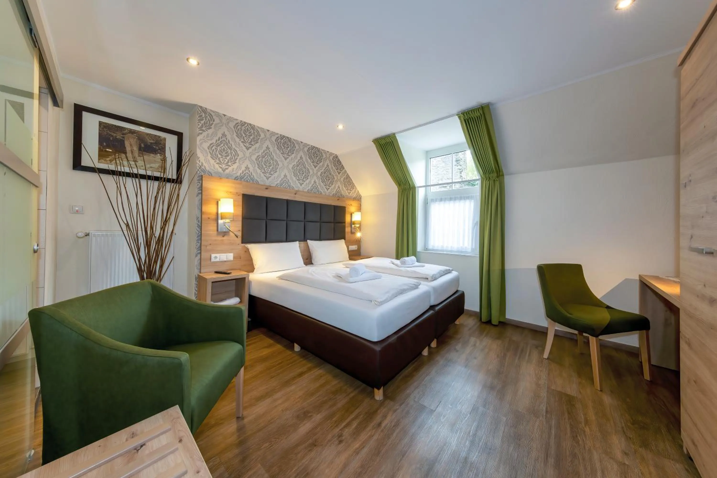 Bed in AKZENT Hotel Restaurant Roter Ochse Rhens bei Koblenz