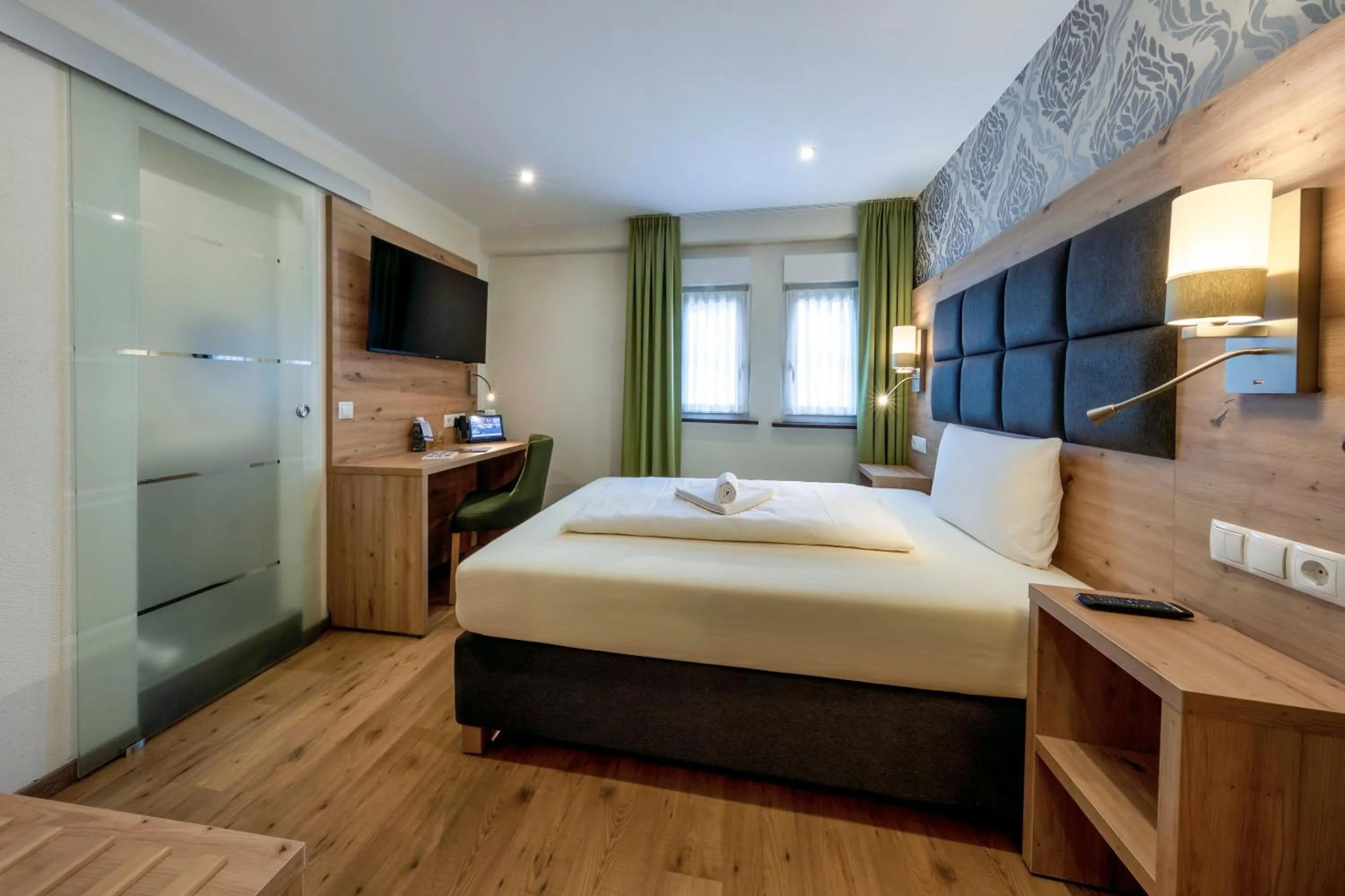 Bed in AKZENT Hotel Restaurant Roter Ochse Rhens bei Koblenz