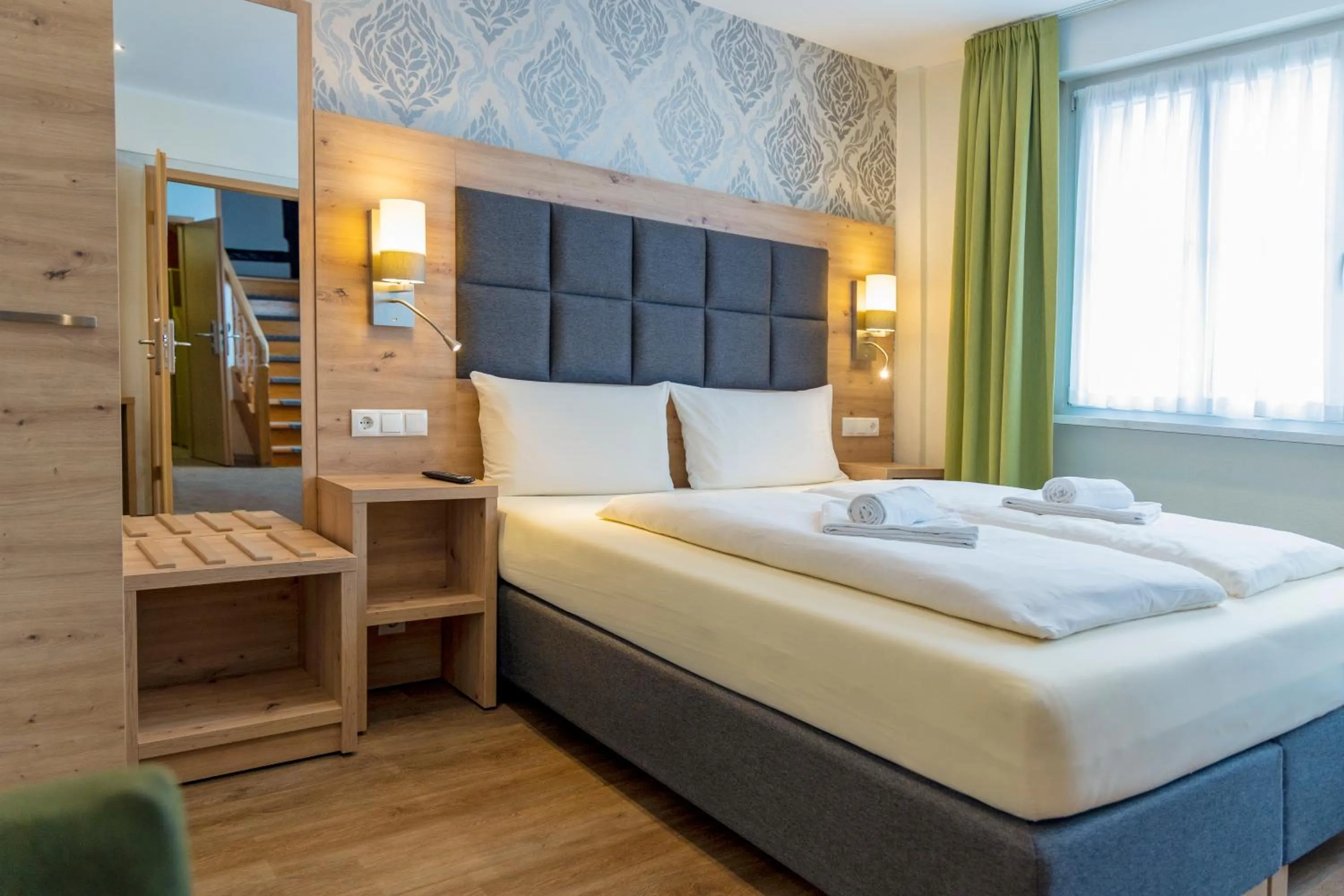 Bed in AKZENT Hotel Restaurant Roter Ochse Rhens bei Koblenz