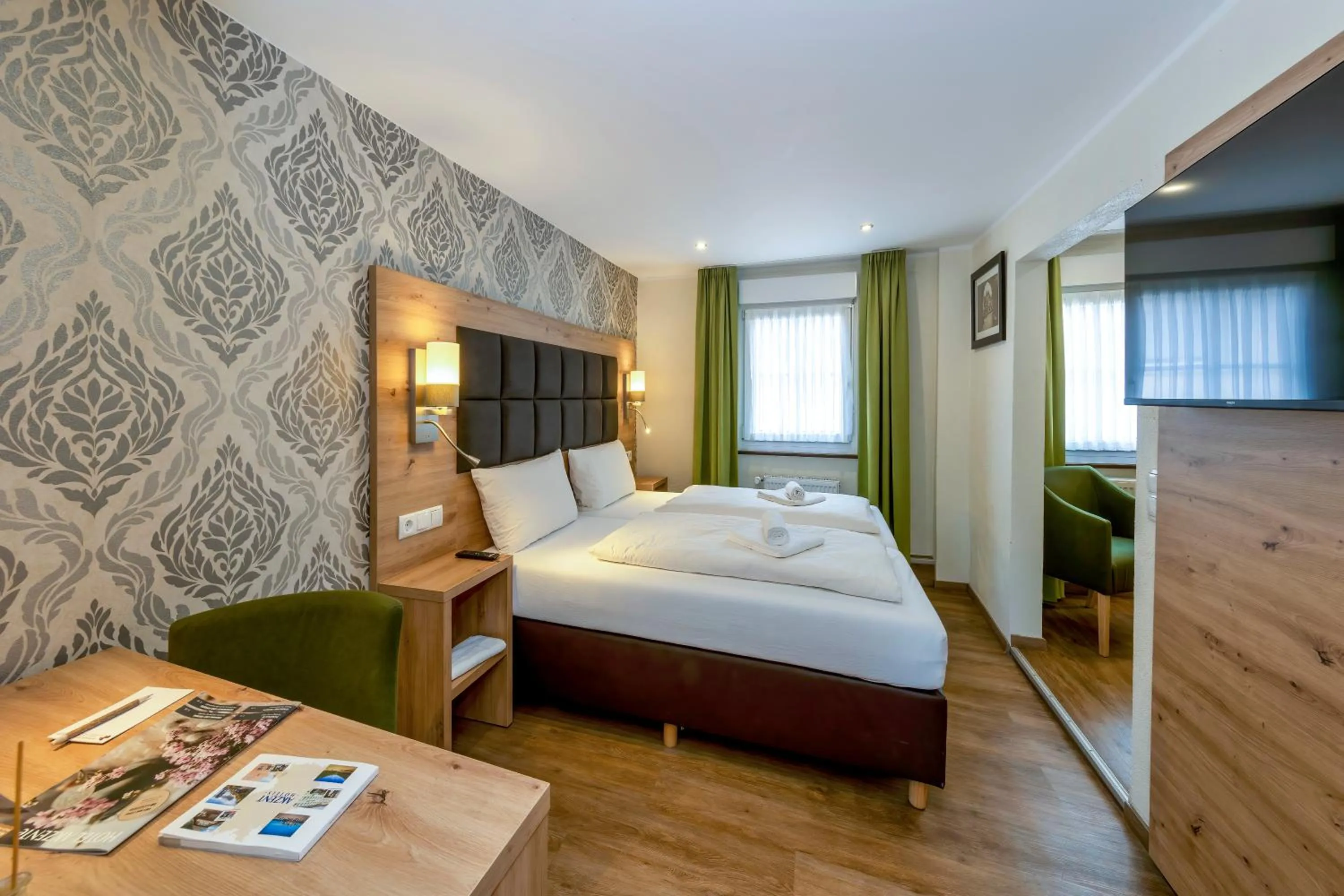 Bed in AKZENT Hotel Restaurant Roter Ochse Rhens bei Koblenz