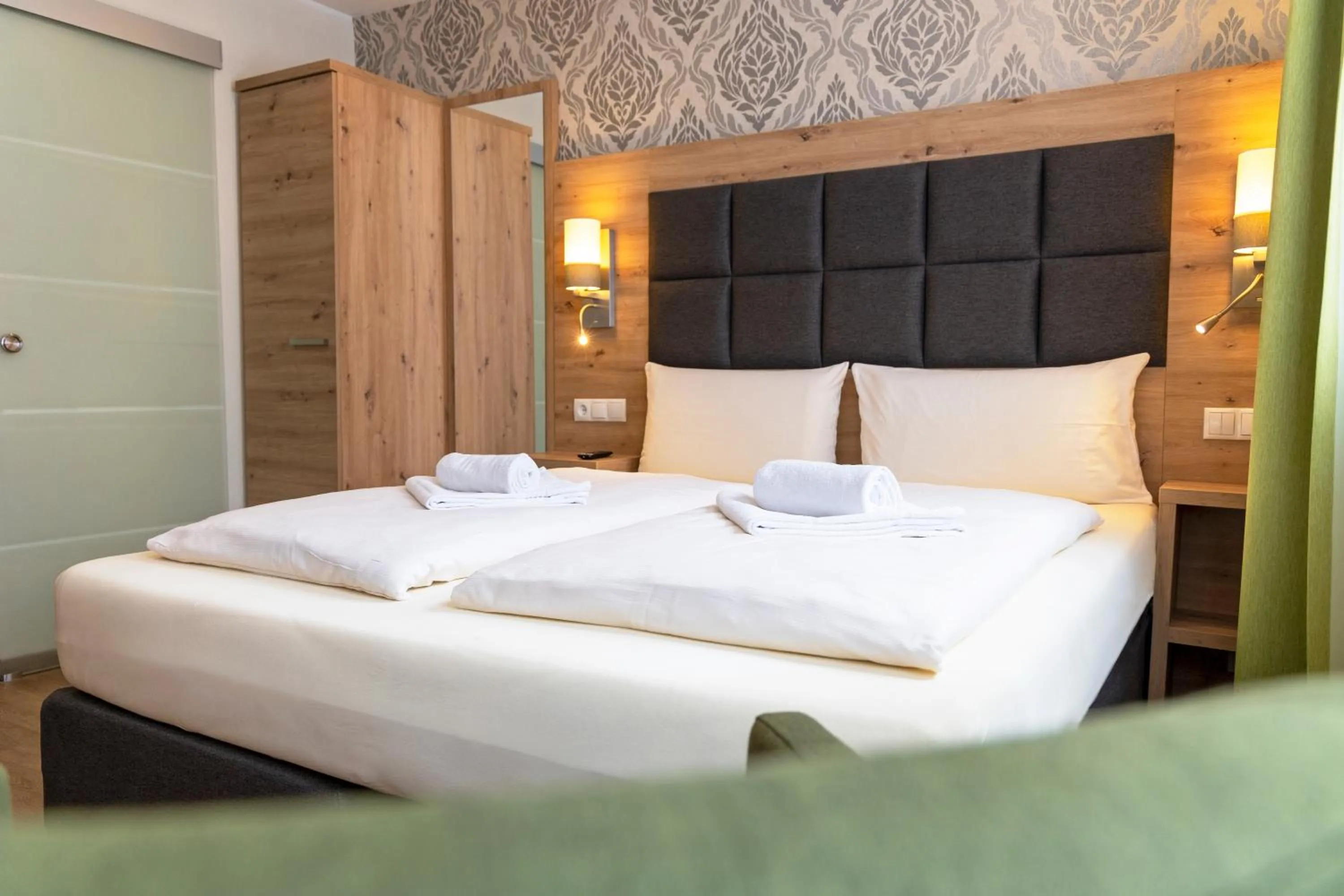 Bed in AKZENT Hotel Restaurant Roter Ochse Rhens bei Koblenz