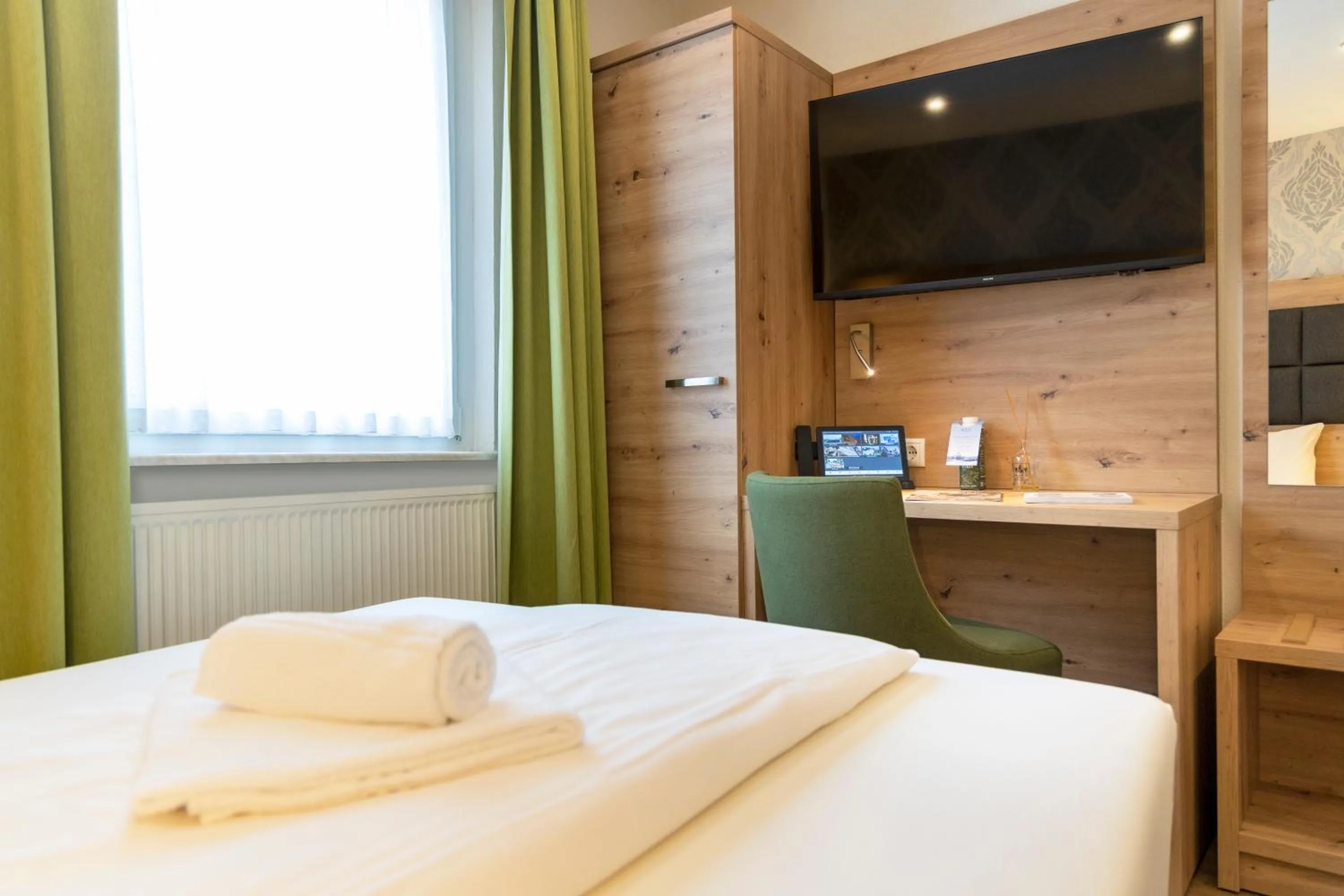 Bed in AKZENT Hotel Restaurant Roter Ochse Rhens bei Koblenz