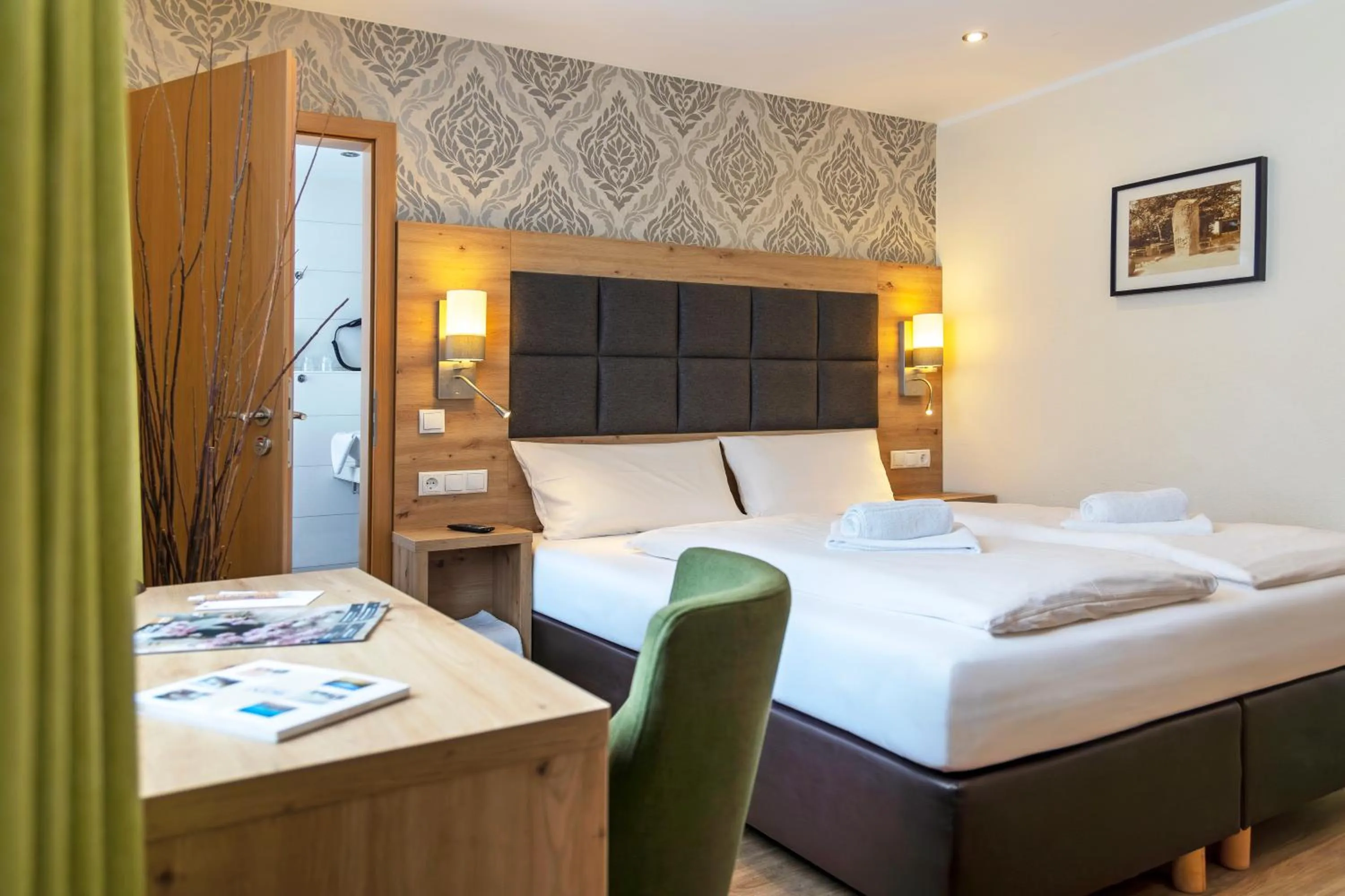 Bed in AKZENT Hotel Restaurant Roter Ochse Rhens bei Koblenz