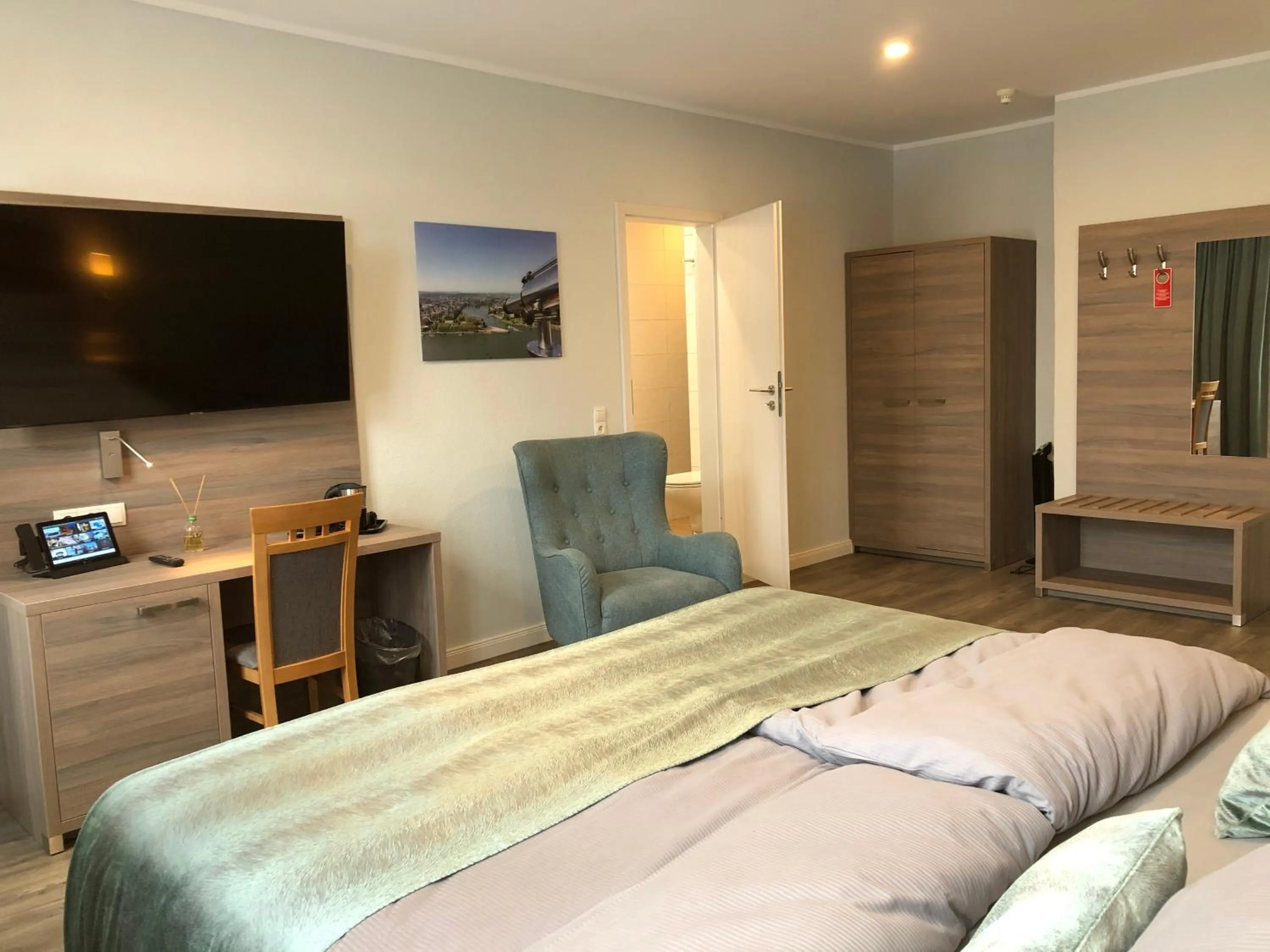 Bed in AKZENT Hotel Restaurant Roter Ochse Rhens bei Koblenz