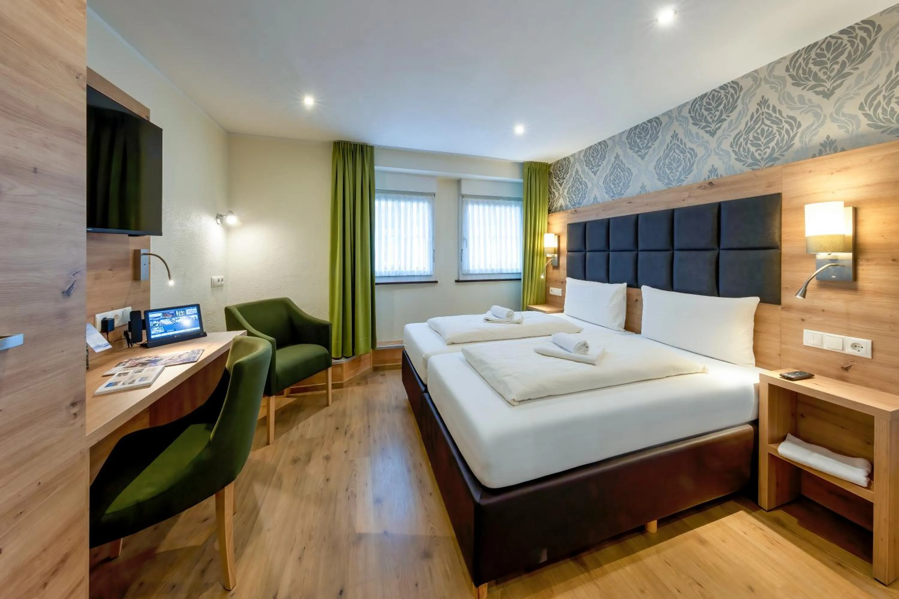 Bed in AKZENT Hotel Restaurant Roter Ochse Rhens bei Koblenz