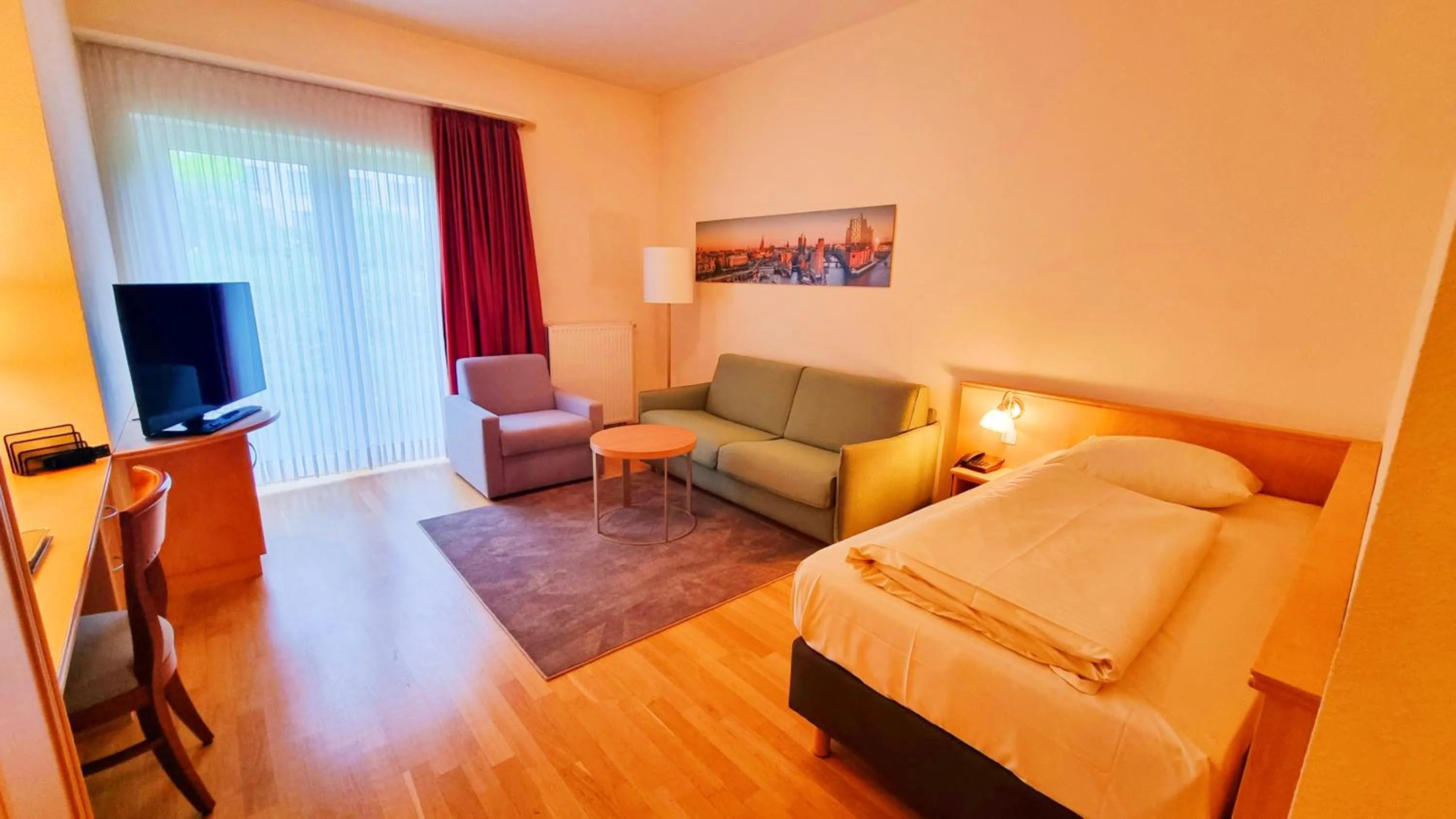 Photo of the whole room in New Living Home Residenzhotel Hamburg