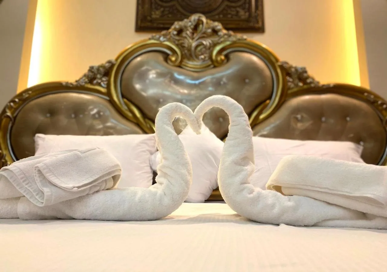 Bed in Majestic Hotel