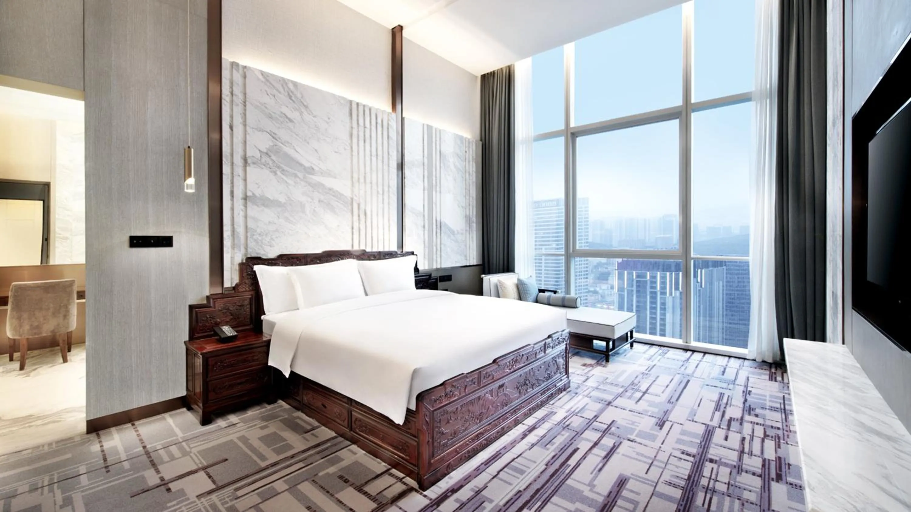 Photo of the whole room, Bed in Crowne Plaza Dalian Xinghai by IHG