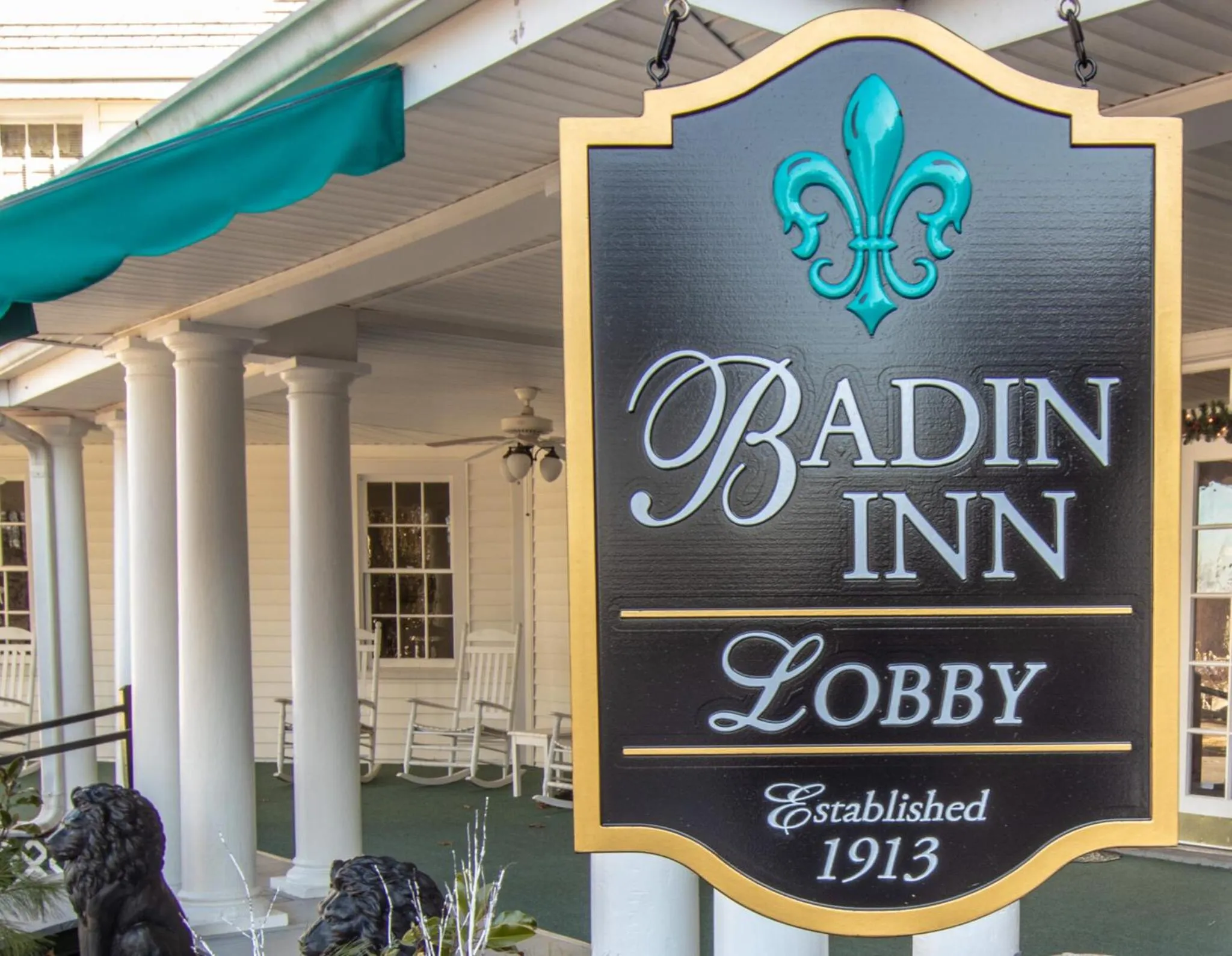 Property logo or sign in 1913 Badin Inn