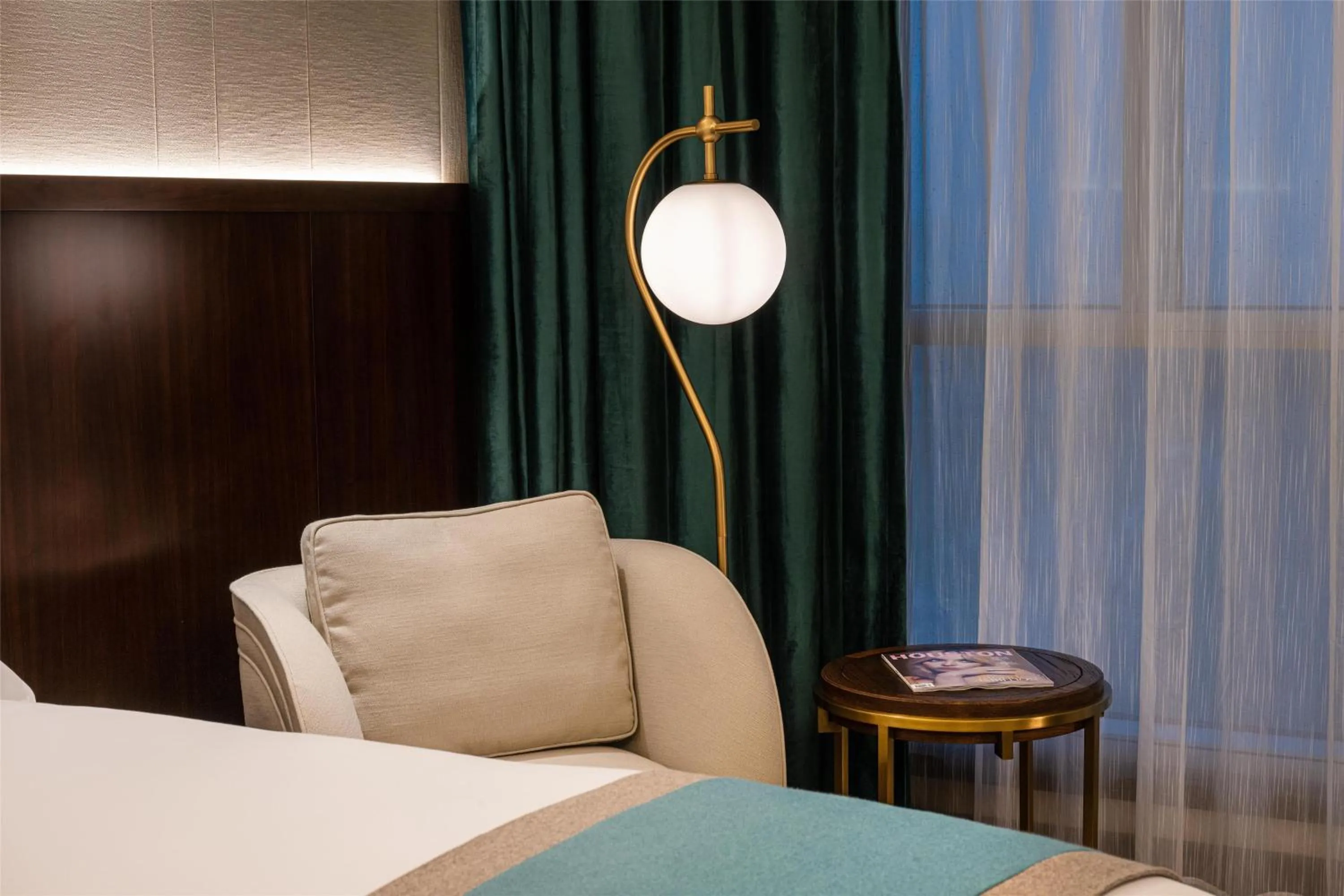 Living room, Bed in Blossom Hotel Houston, Curio Collection by Hilton