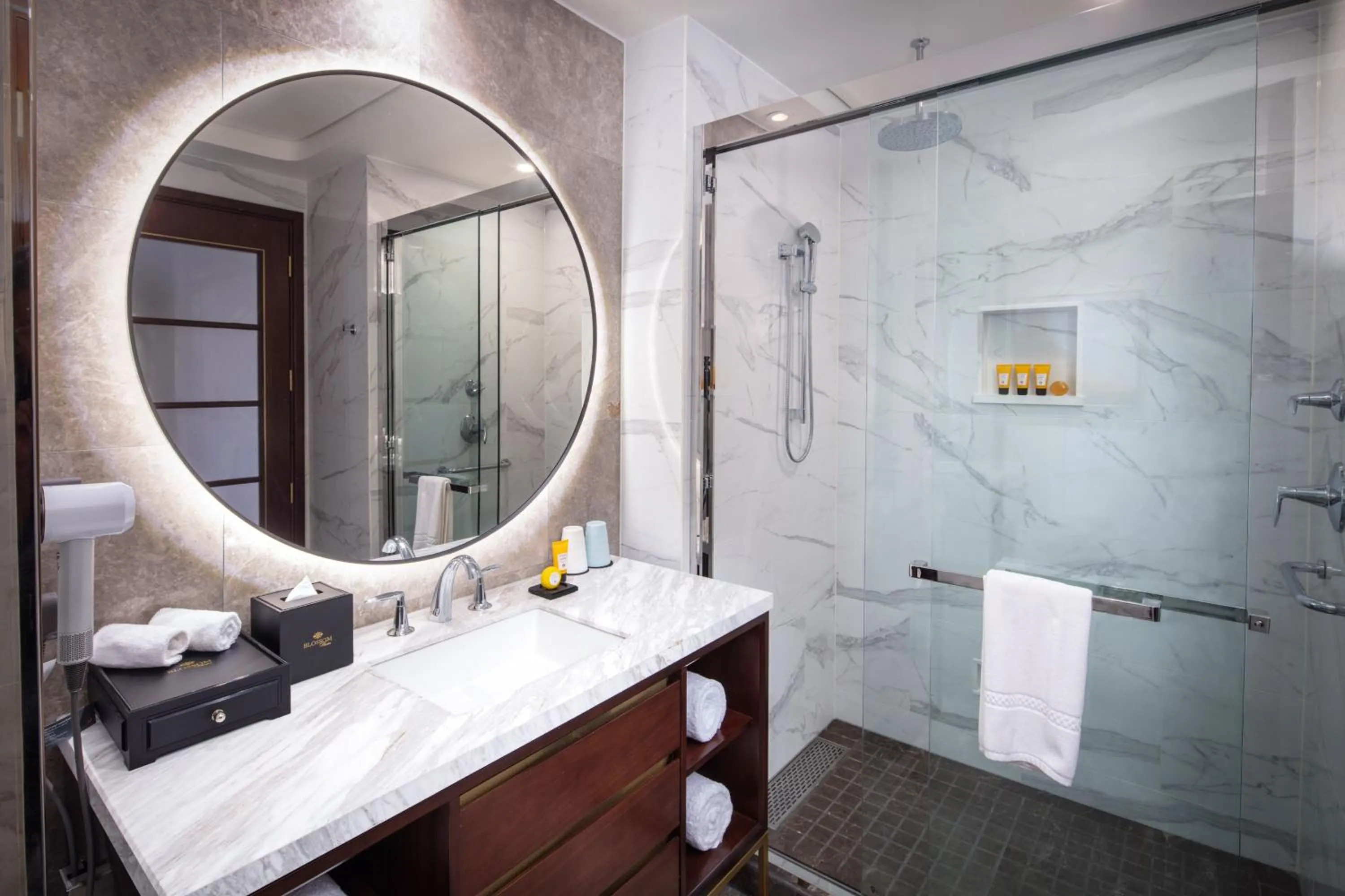 Bathroom in Blossom Hotel Houston, Curio Collection by Hilton