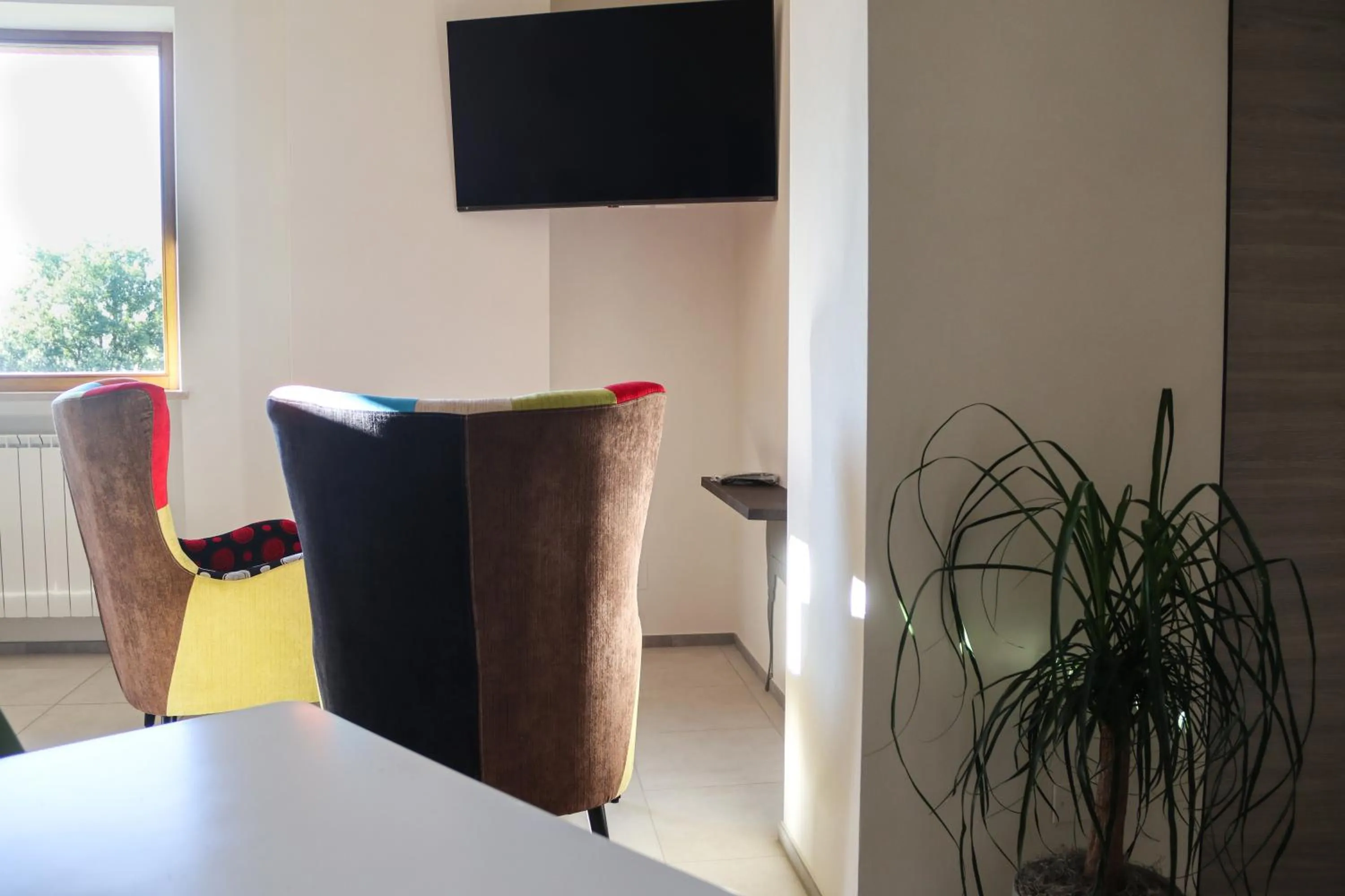 Communal lounge/ TV room in B&B La Quiete