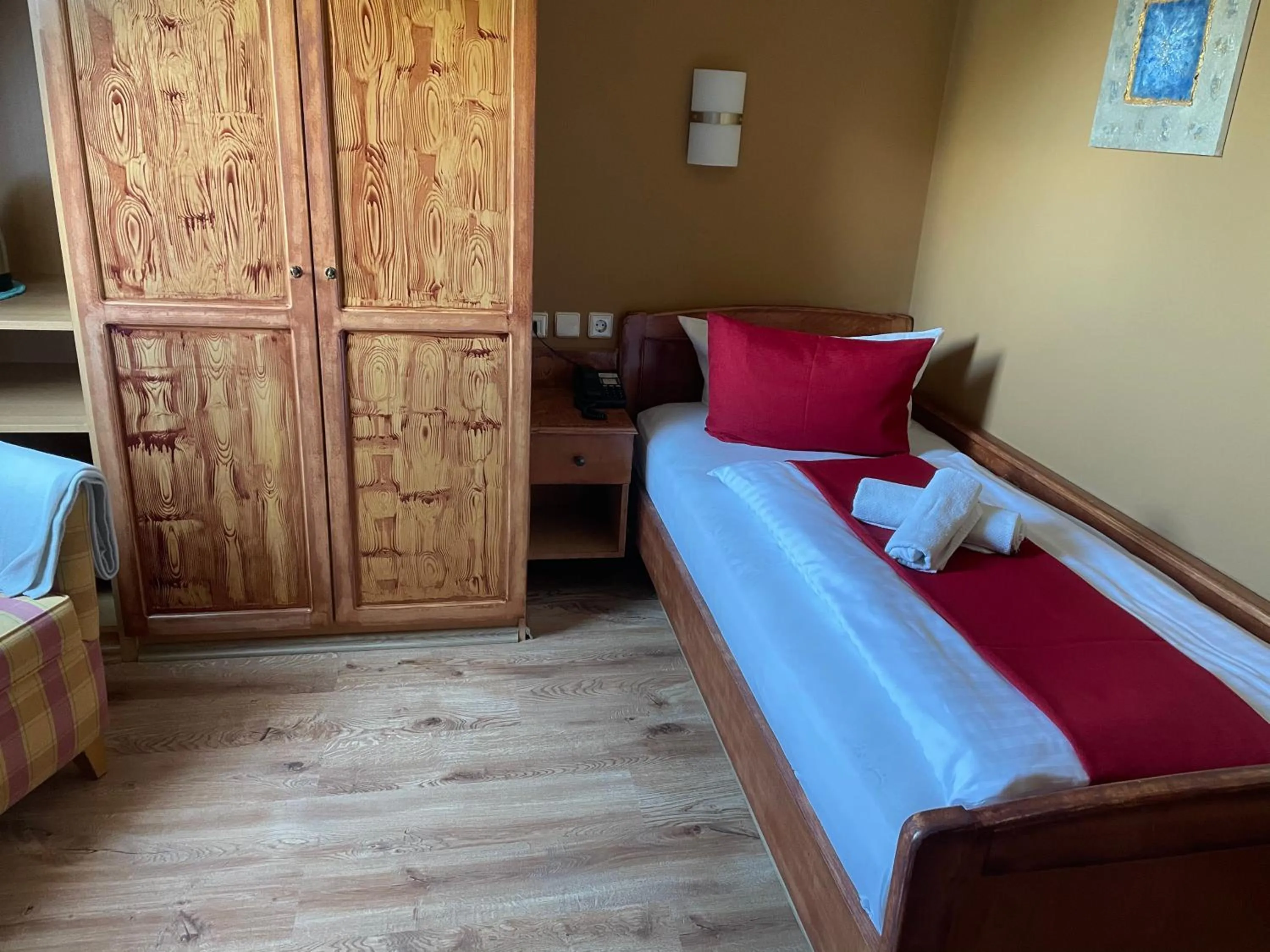 Bed in Berghotel Drei Brüder Höhe