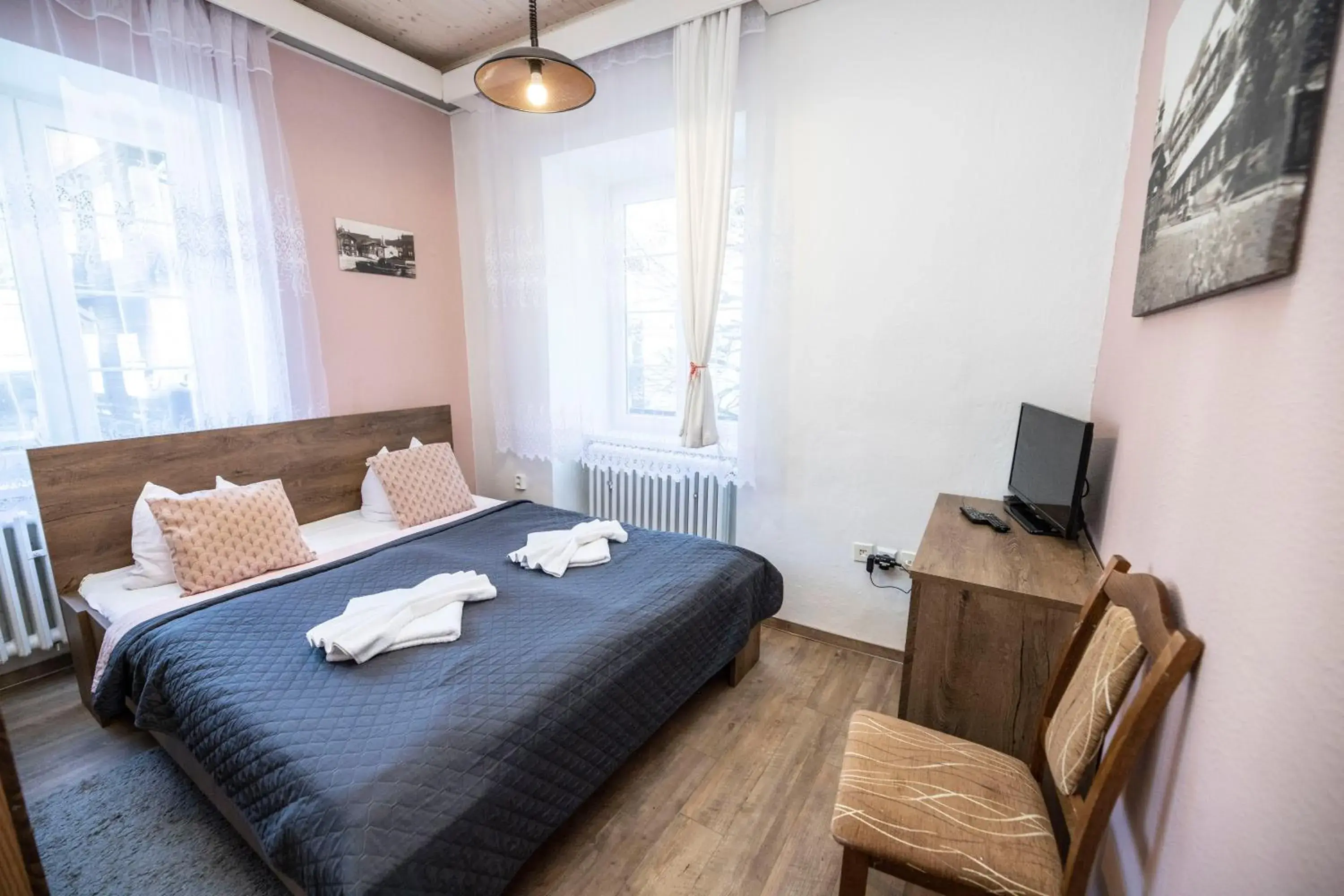 Quadruple Room with Private Bathroom - single occupancy in Hotel Džbán Quadruple Room with Private Bathroom - single occupancy in Hotel Džbán