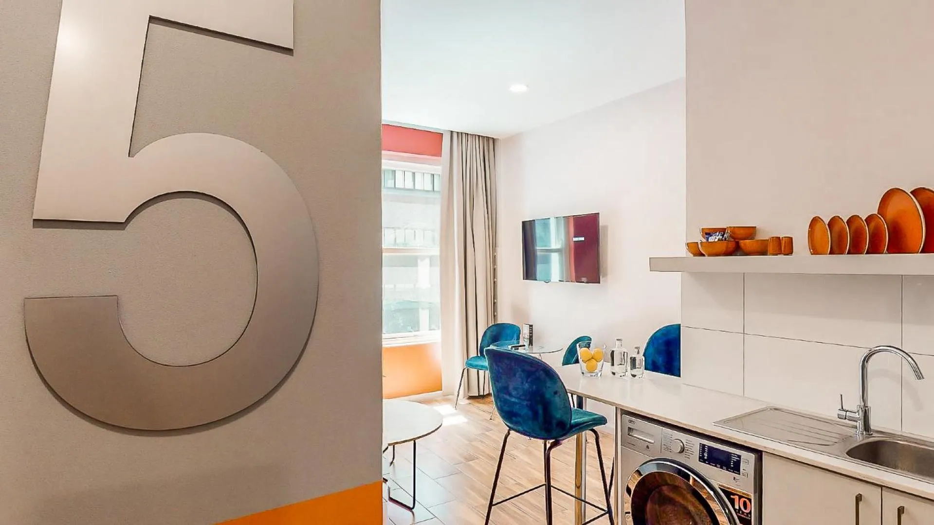 Kitchen or kitchenette in Urban Oasis Aparthotel