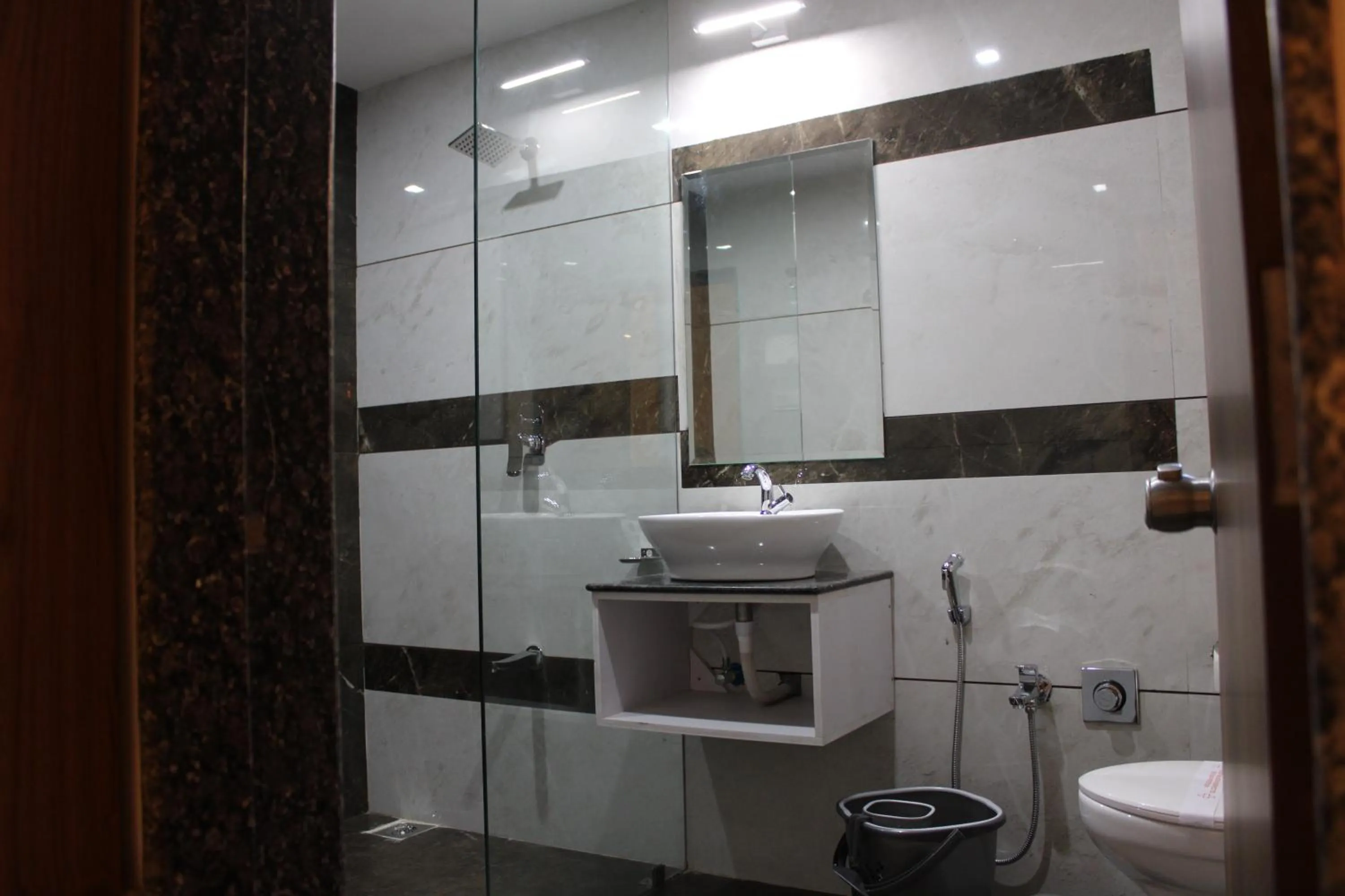 Shower in Hotel The Grand Piano - Best Business Hotel in Patan