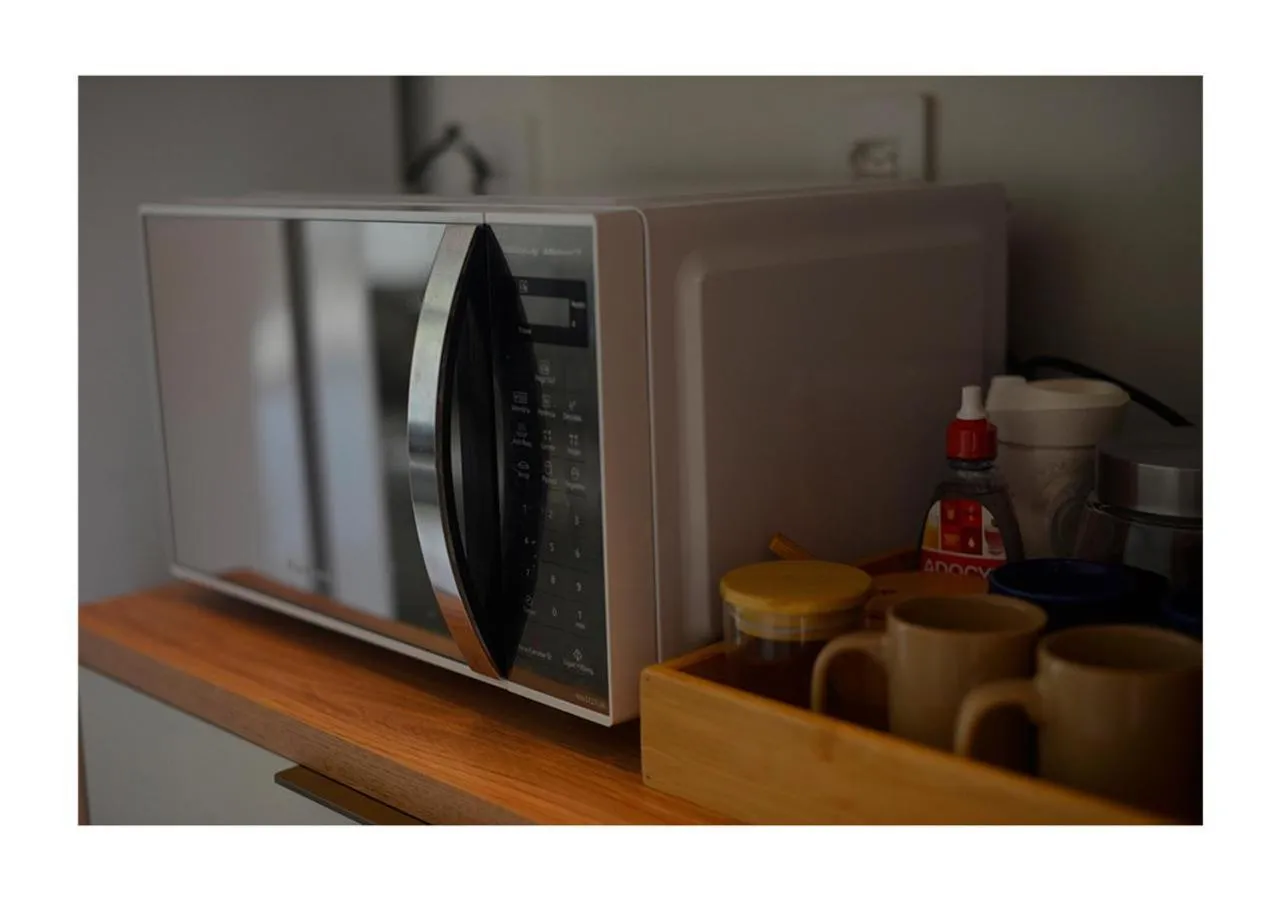 Kitchen or kitchenette in Flat Beach Class Muro Alto 1107