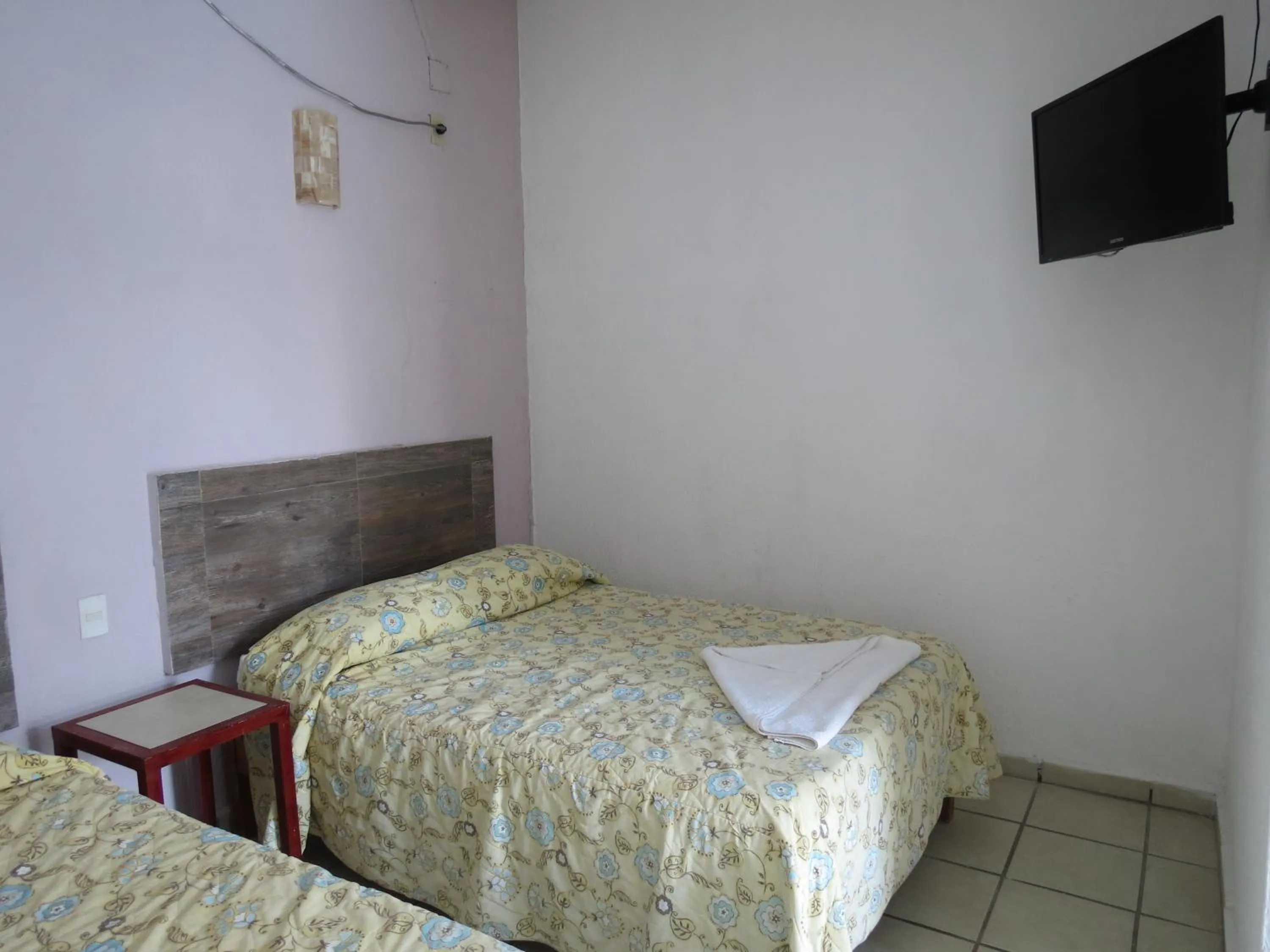 Bed in Hotel Albri by Rotamundos