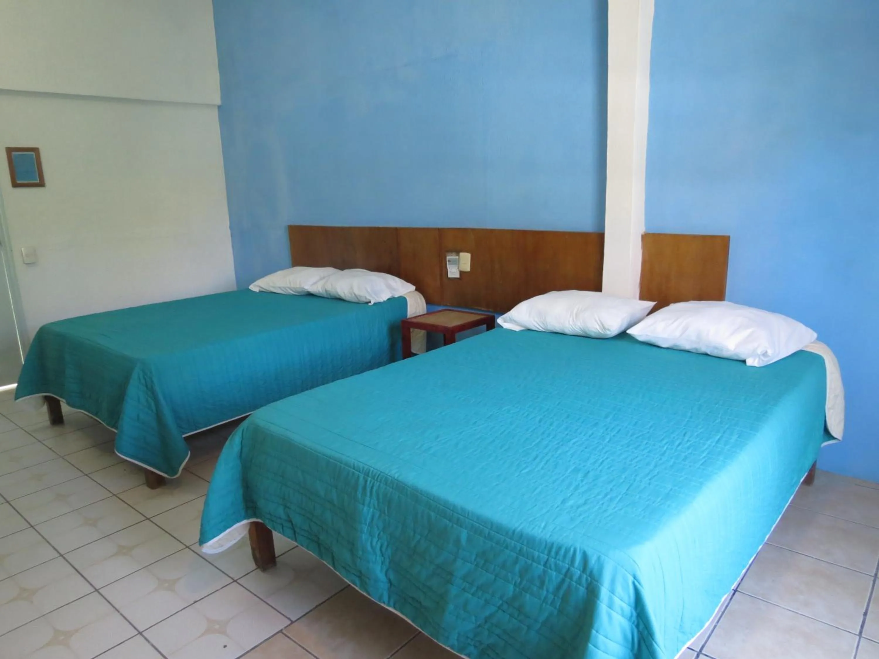 Bed in Hotel Albri by Rotamundos