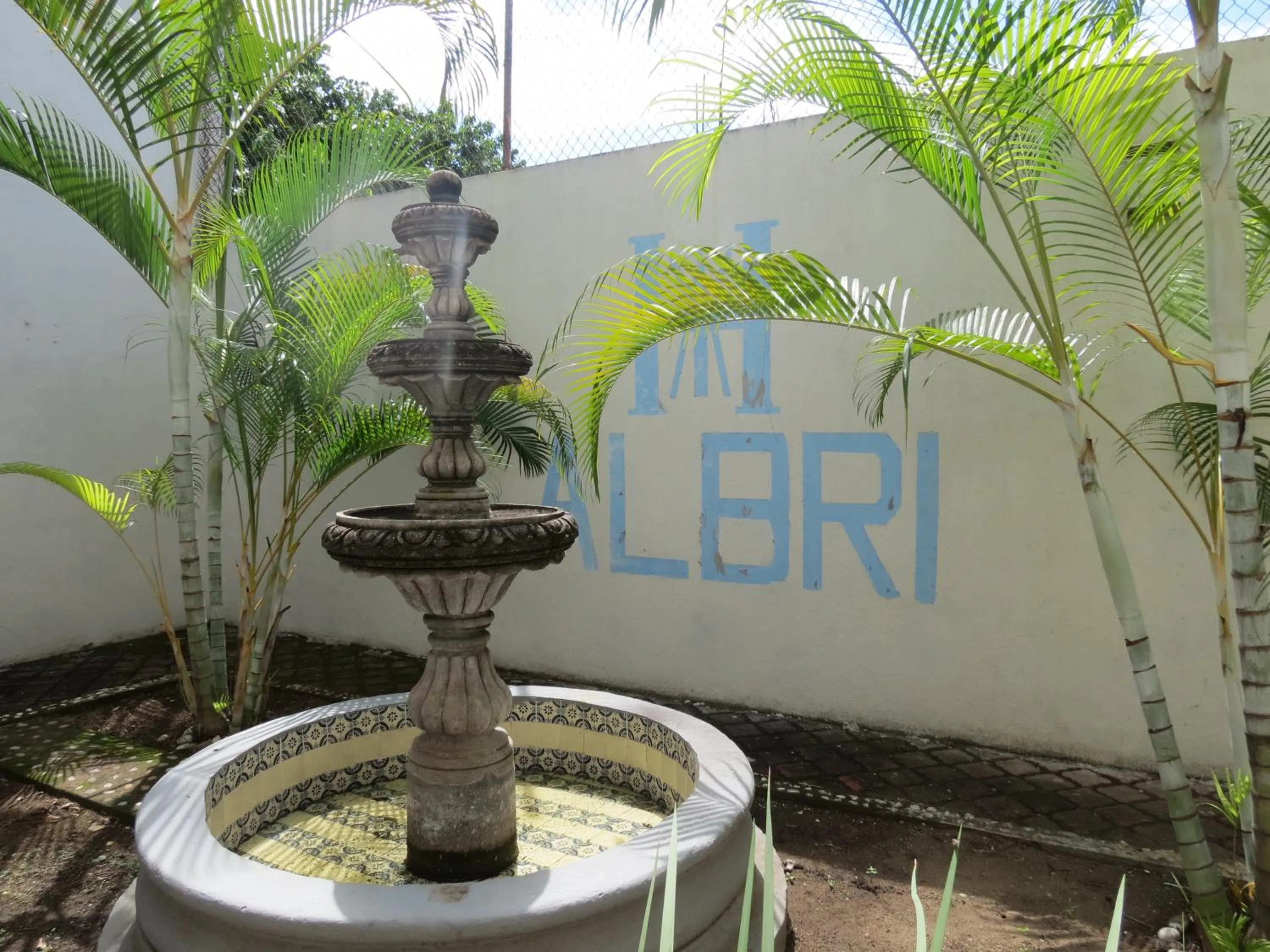 Property logo or sign in Hotel Albri by Rotamundos