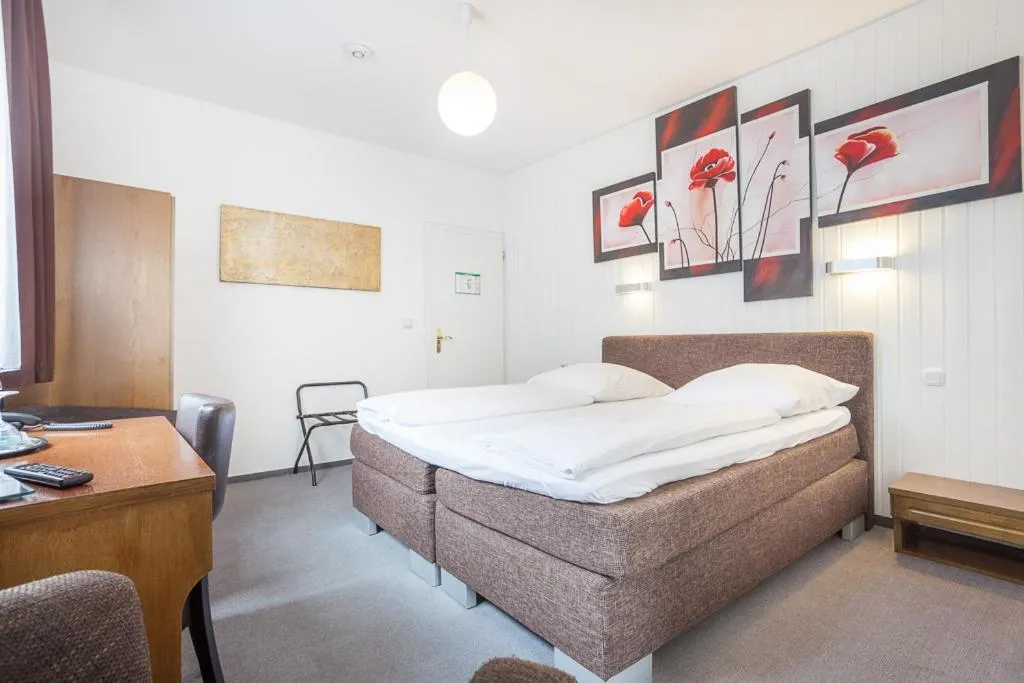 Seating area, Bed in Hotel Union by TM