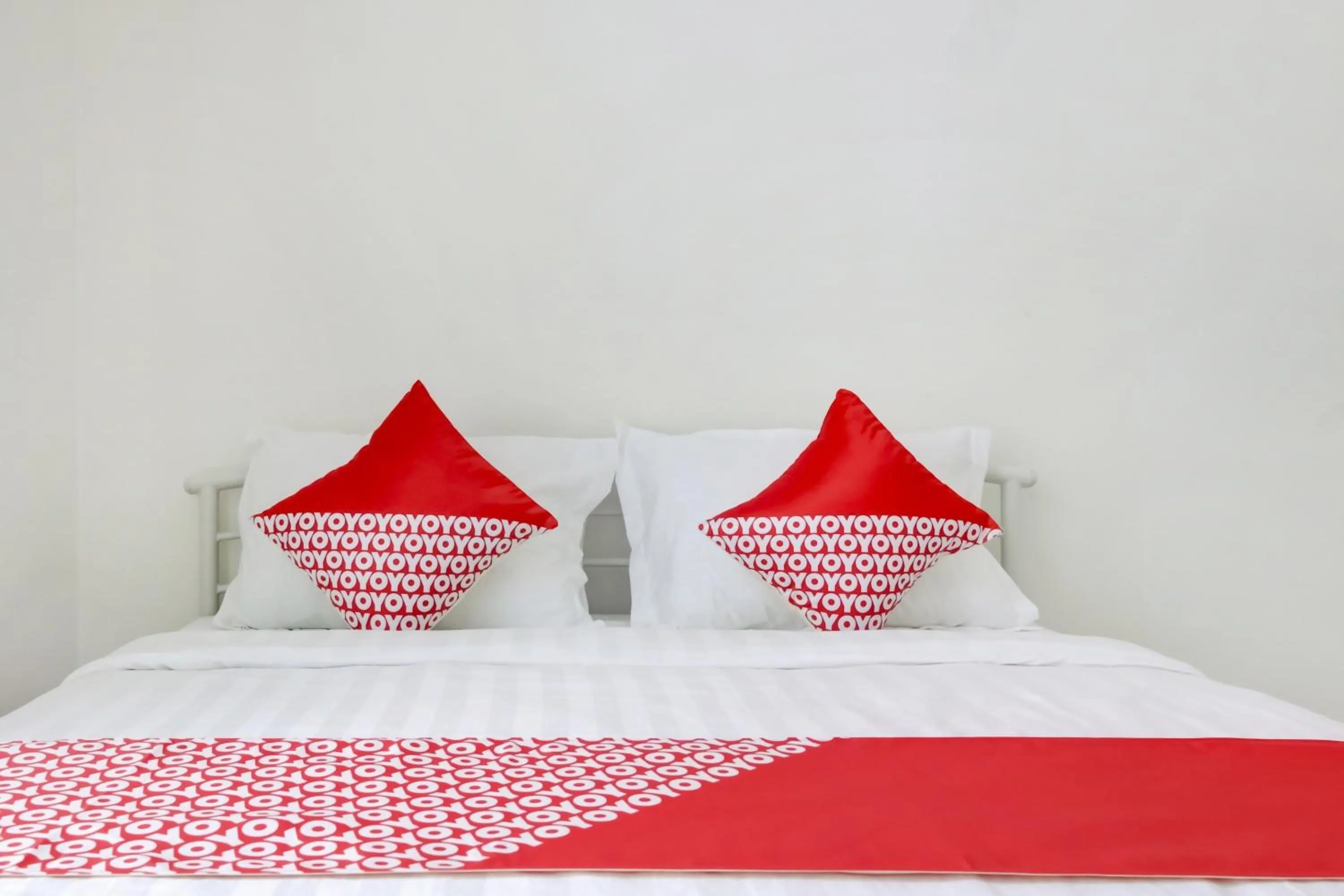 Bedroom in Hotel O Panakkukang Near Mall Panakkukang Formerly Golden White House