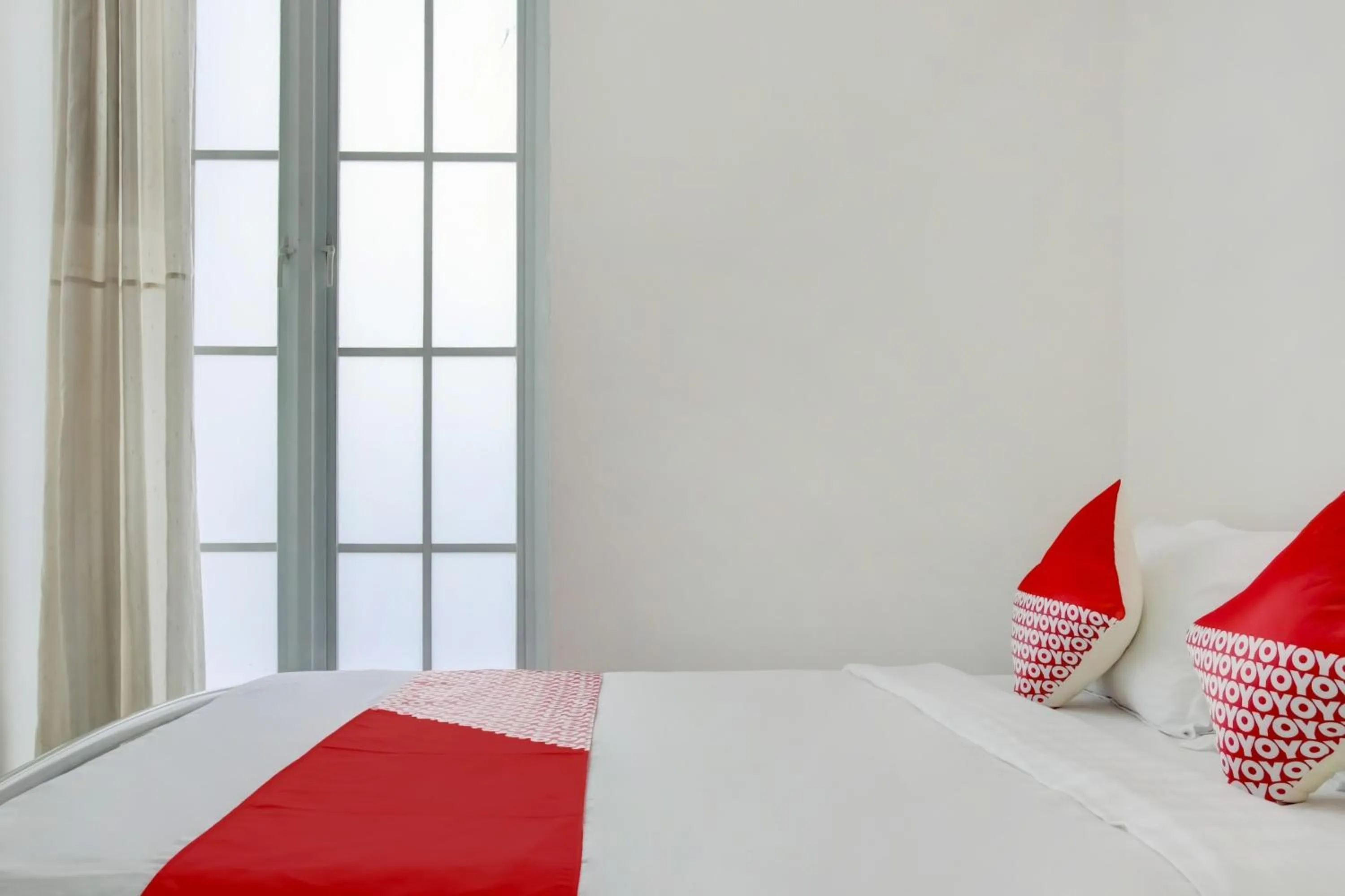 Bedroom in Hotel O Panakkukang Near Mall Panakkukang Formerly Golden White House