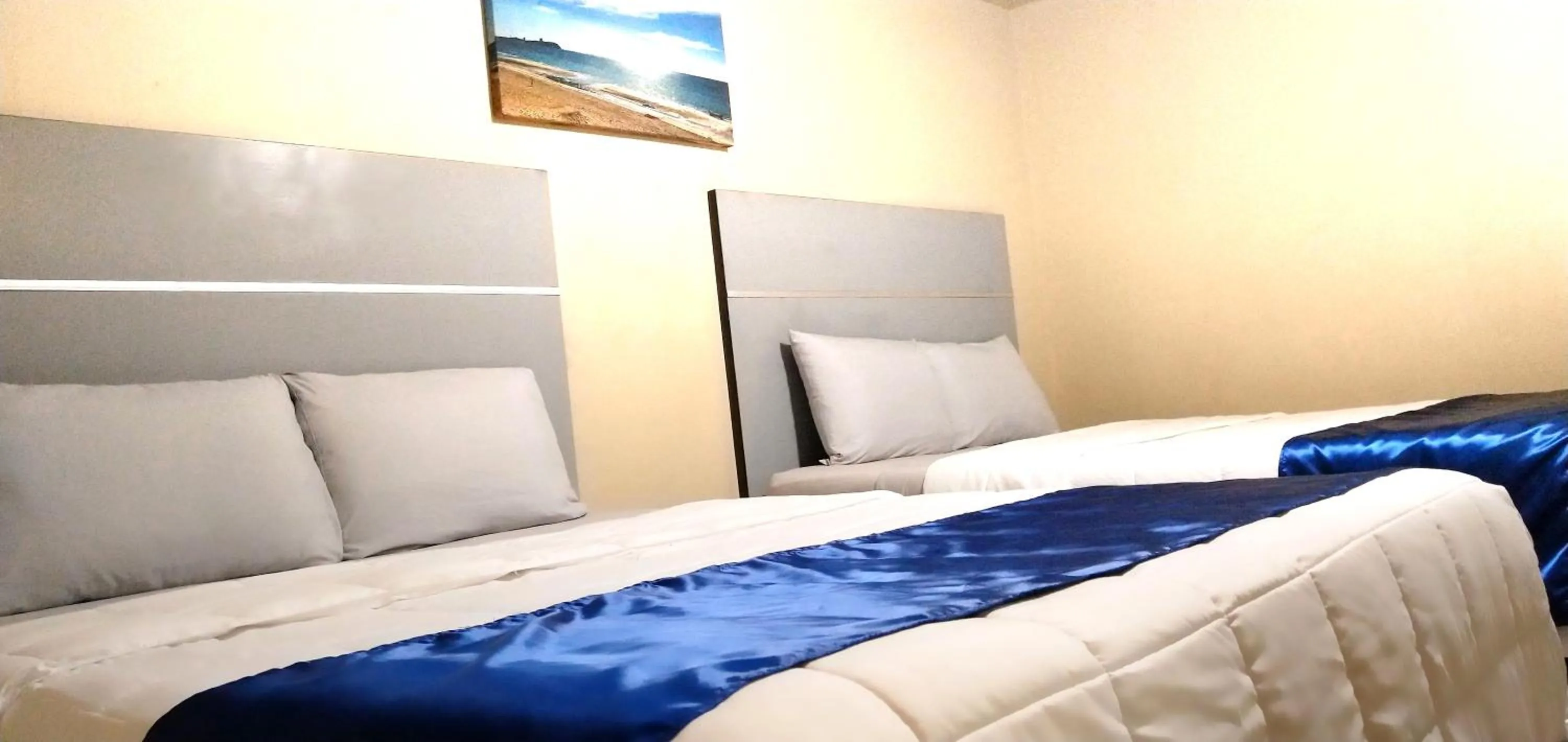 Bed in Pearl Point Hotel