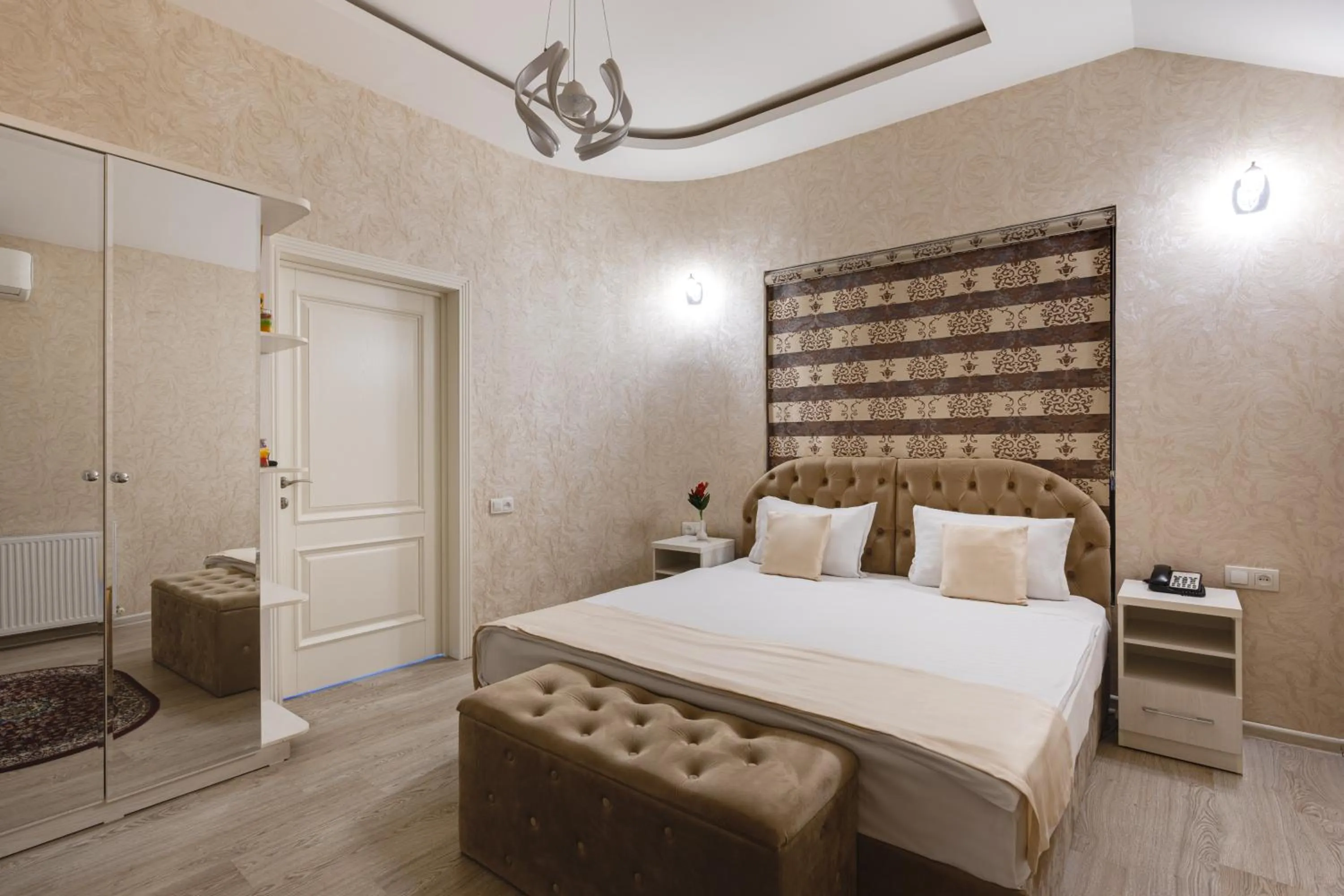 Photo of the whole room, Bed in Shoxjahon Hotel - 600 Mbps Internet