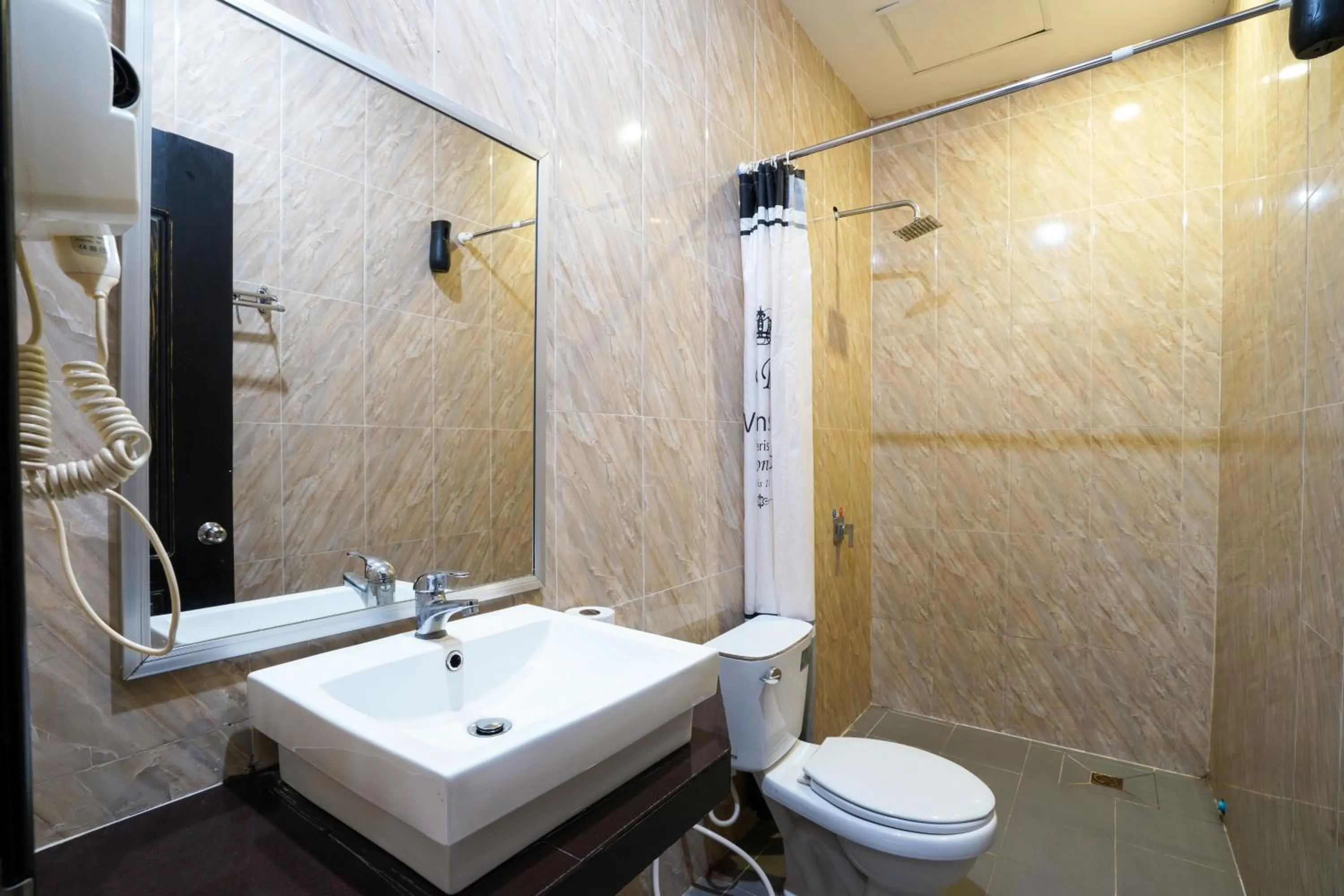 Toilet in Tan Sokchea Boutique