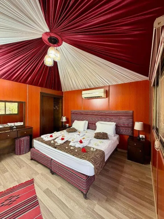 Bed in Rum Oasis Luxury Camp