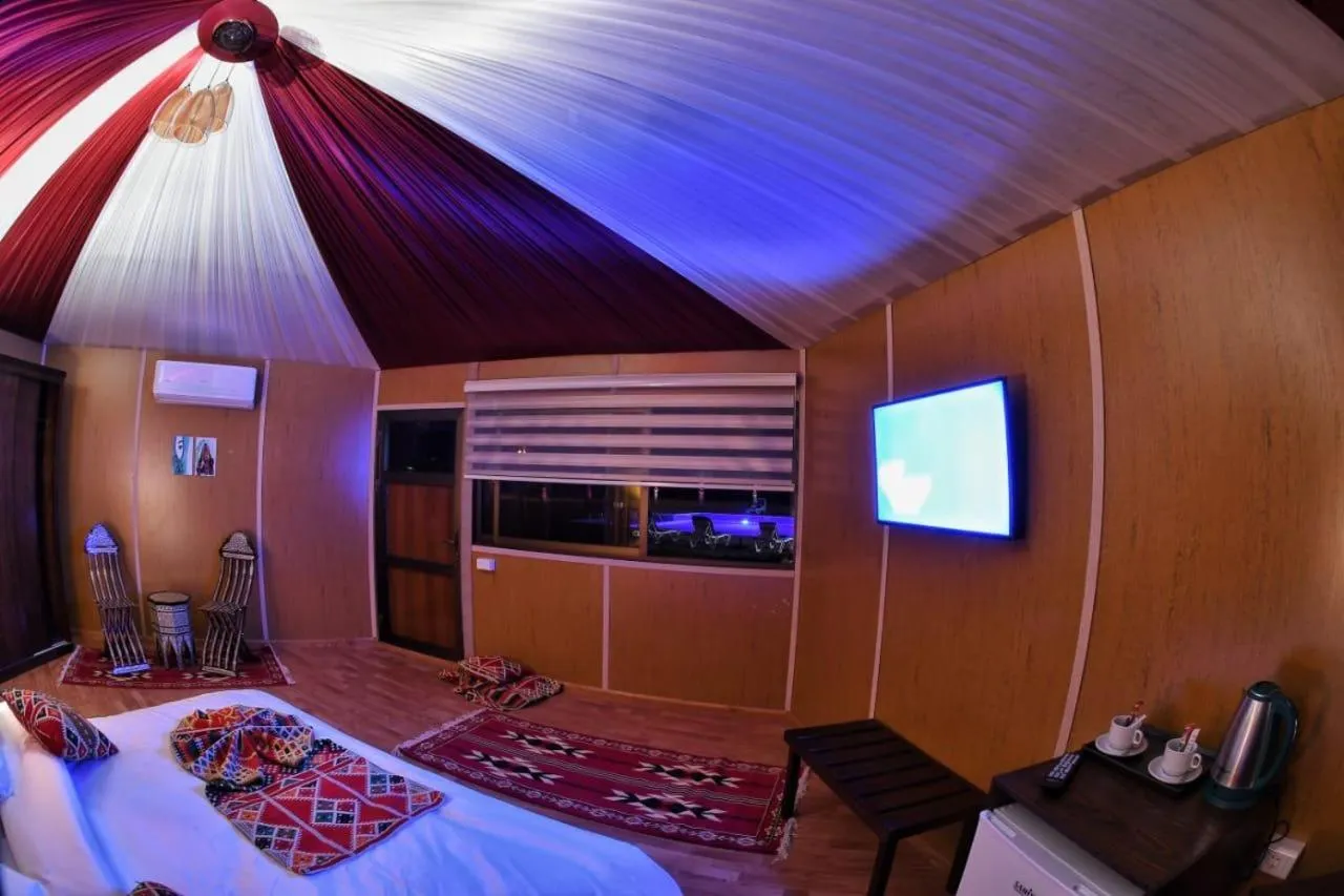Bed in Rum Oasis Luxury Camp