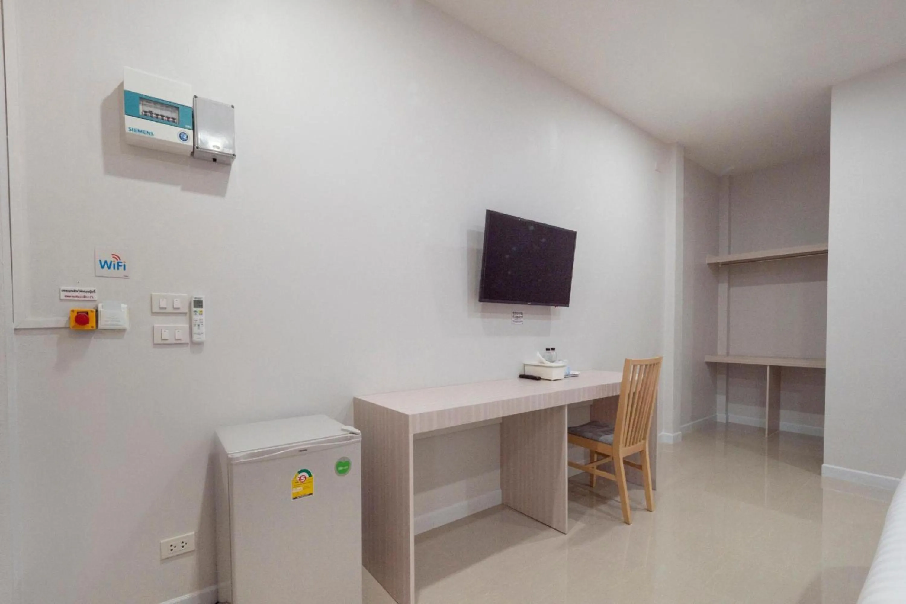 Bedroom in Capital O 75378 Thawapee Resort