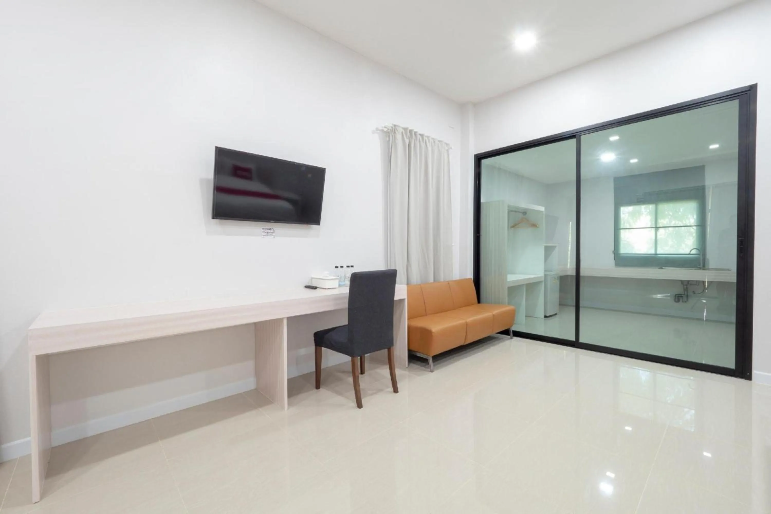 Bedroom in Capital O 75378 Thawapee Resort