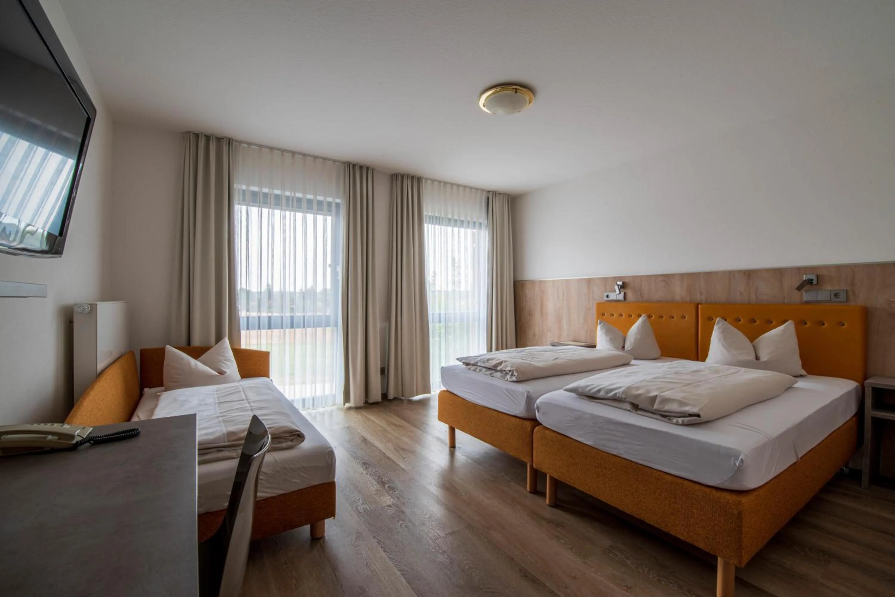 Photo of the whole room, Bed in Landhotel Seerose