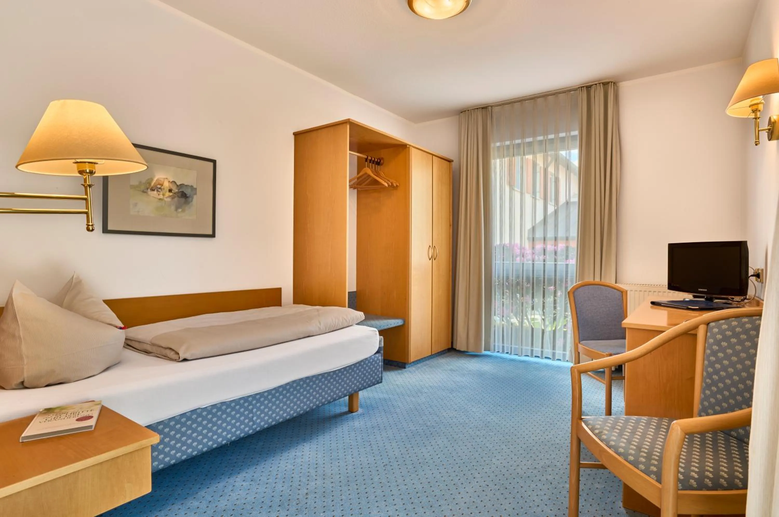 Photo of the whole room, Bed in Landhotel Seerose