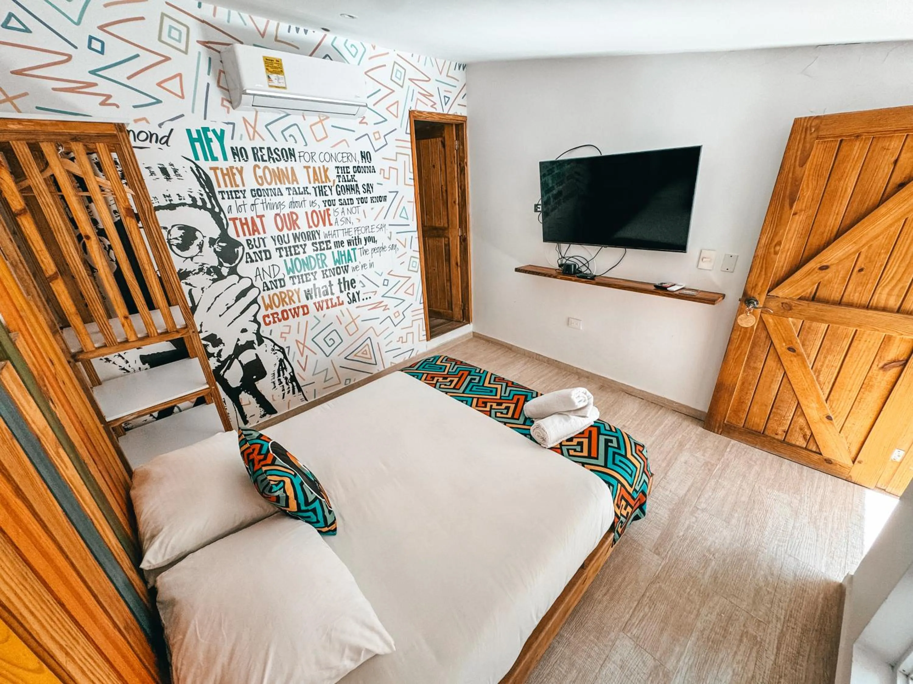 Bedroom, Bed in In Di House of Reggae Boutique