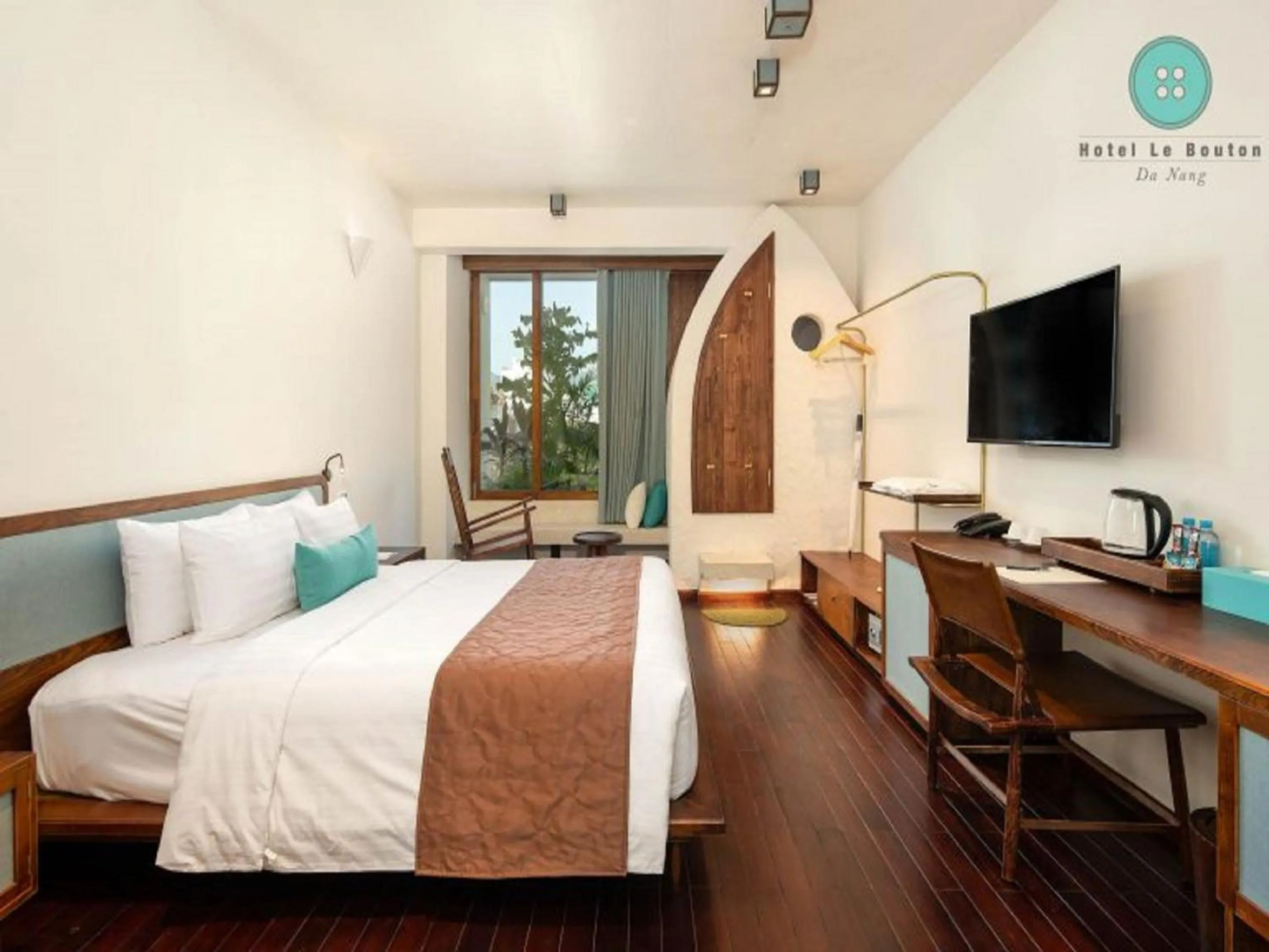 Bed in Hotel Le Bouton