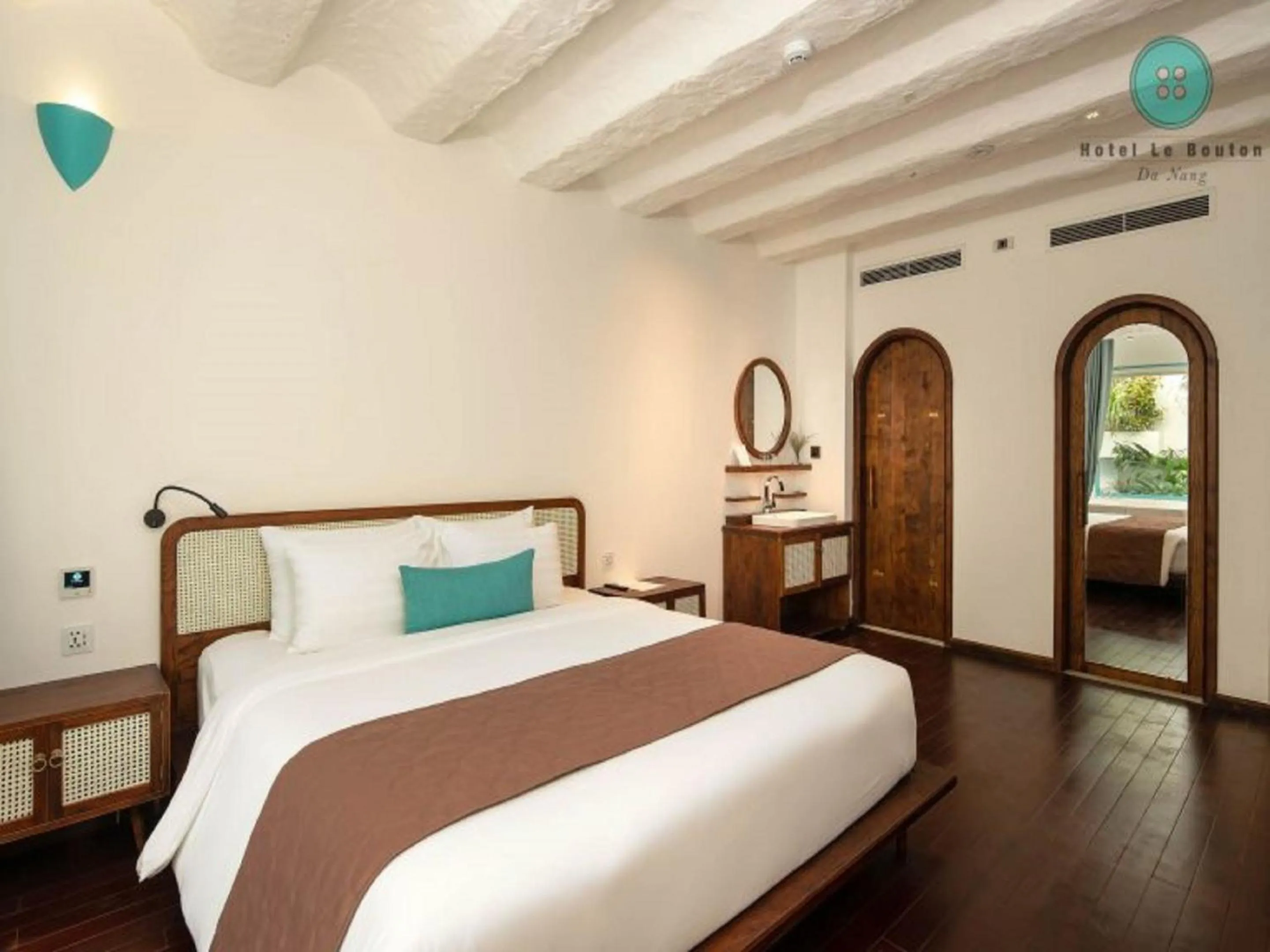 Bed in Hotel Le Bouton