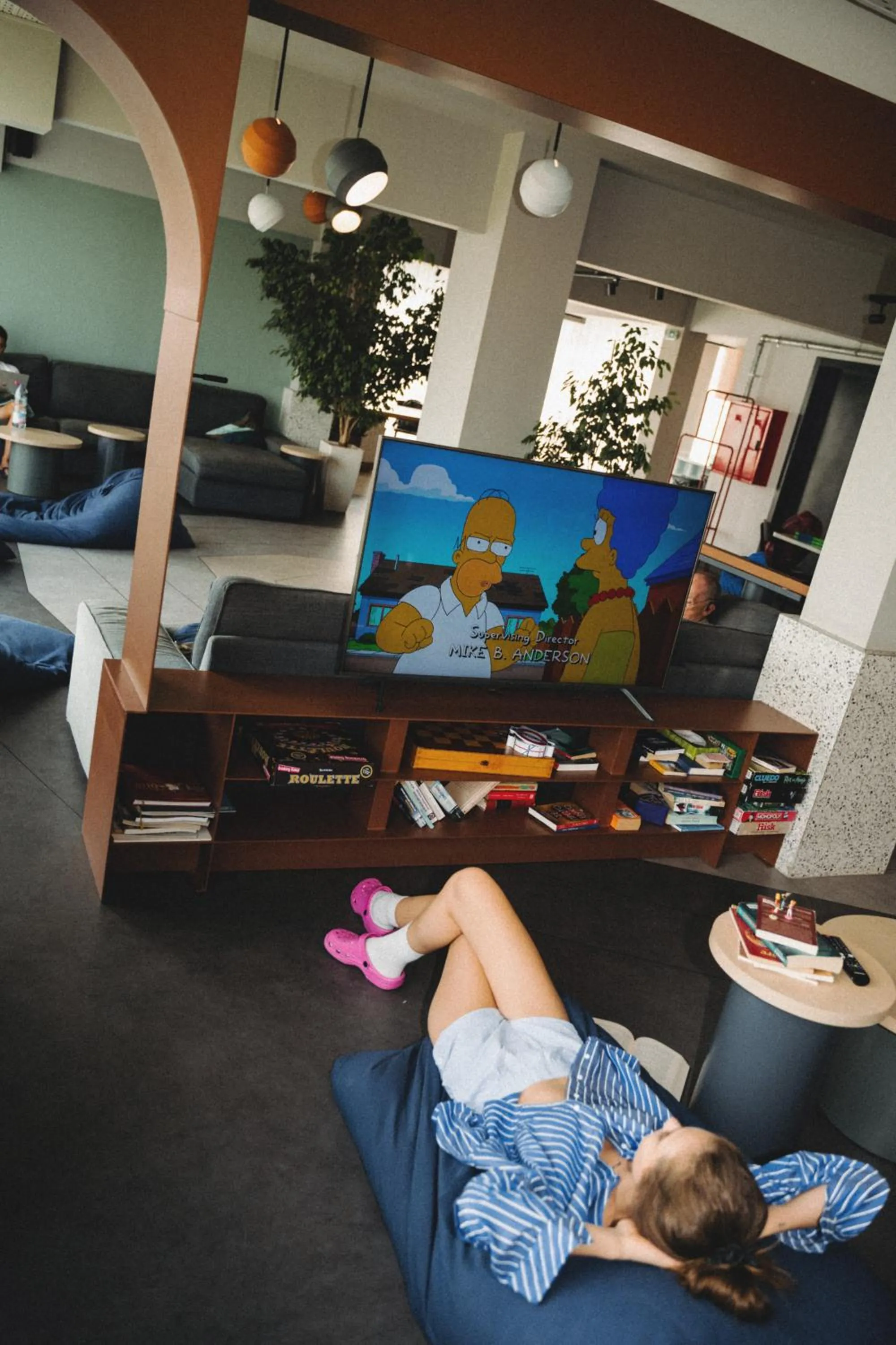 Communal lounge/ TV room in Zeus is Loose Hostel