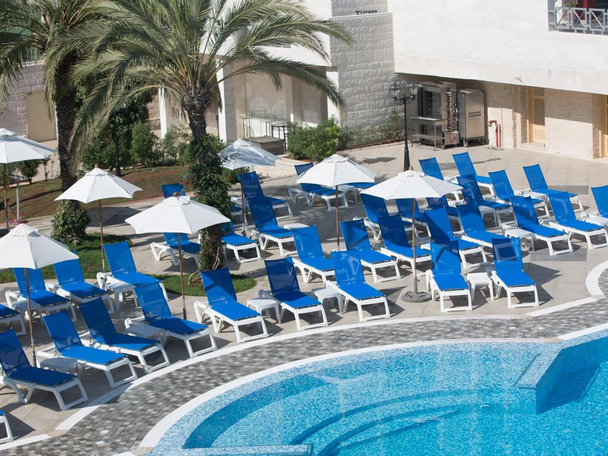 Swimming pool in Crowne Plaza Amman by IHG